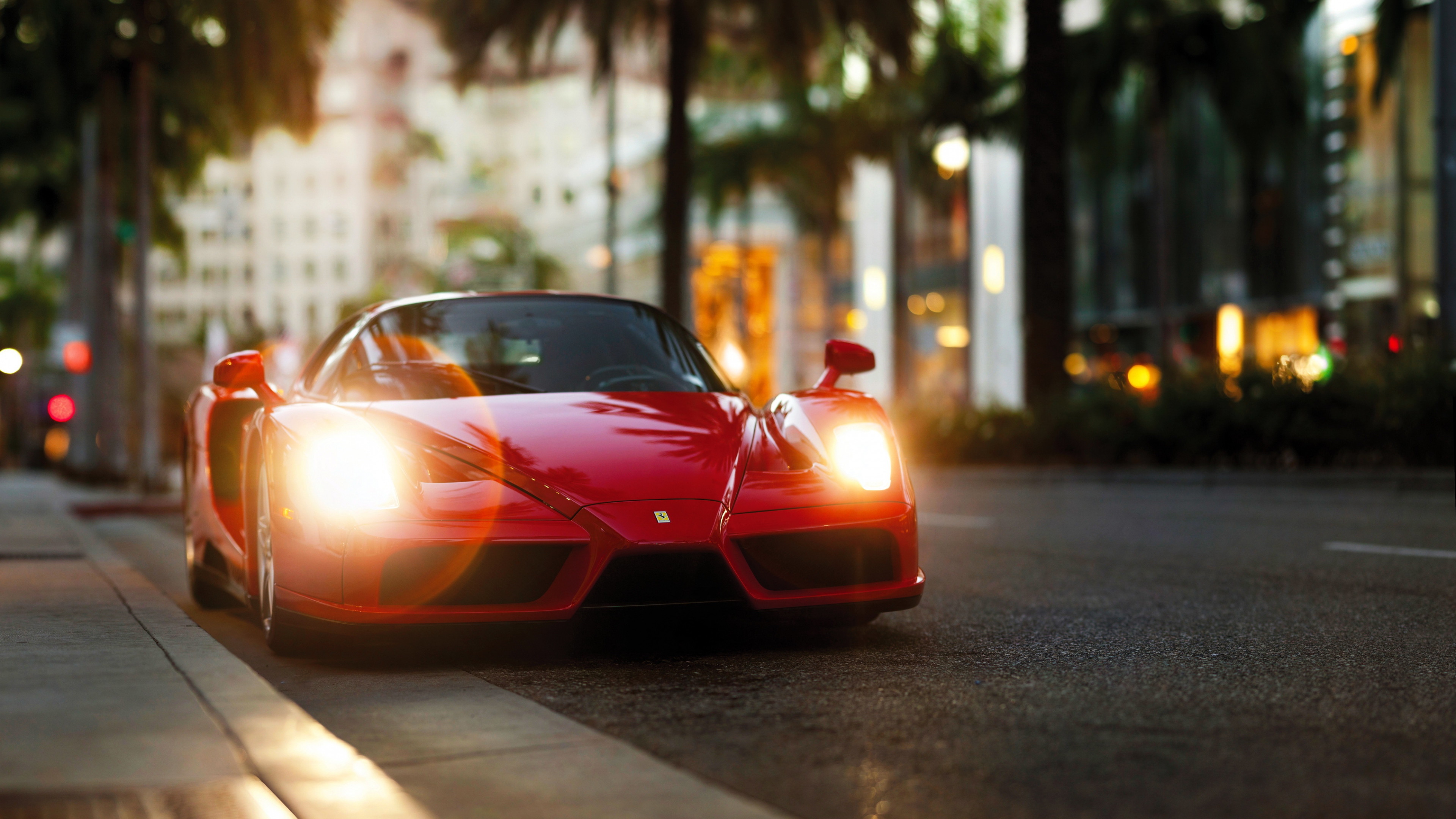 Red Ferrari Enzo parked on a street at dusk HD Wallpaper