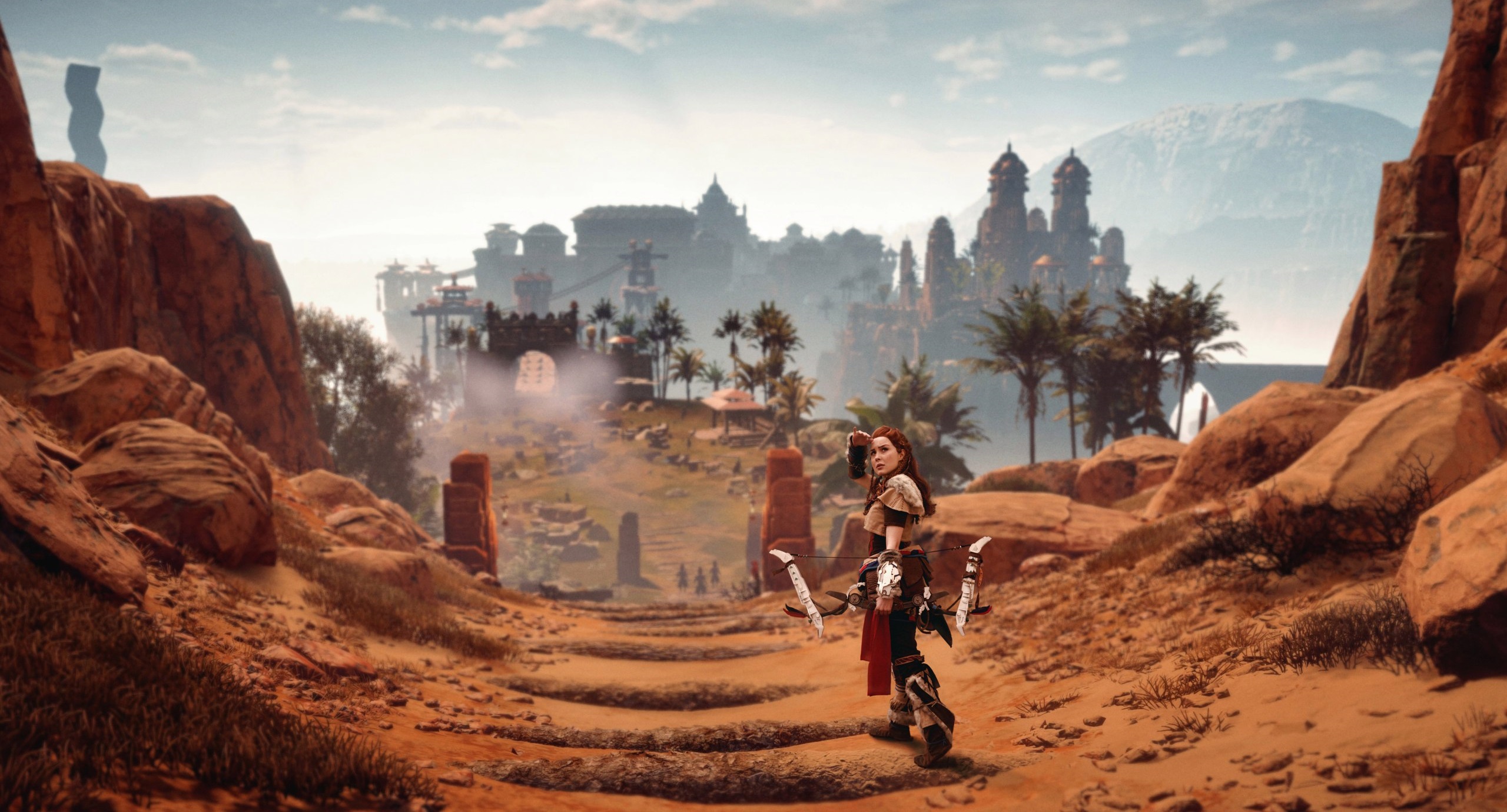 Aloy from Horizon Zero Dawn in a desert landscape HD Wallpaper