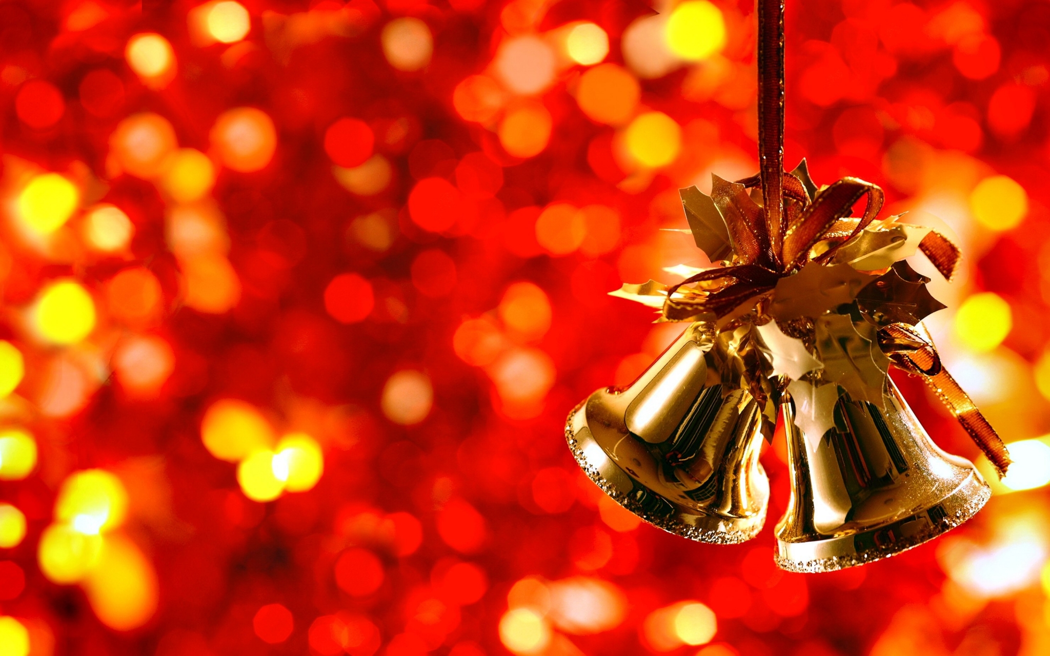 Christmas Bells with Red and Yellow Bokeh Background HD Wallpaper