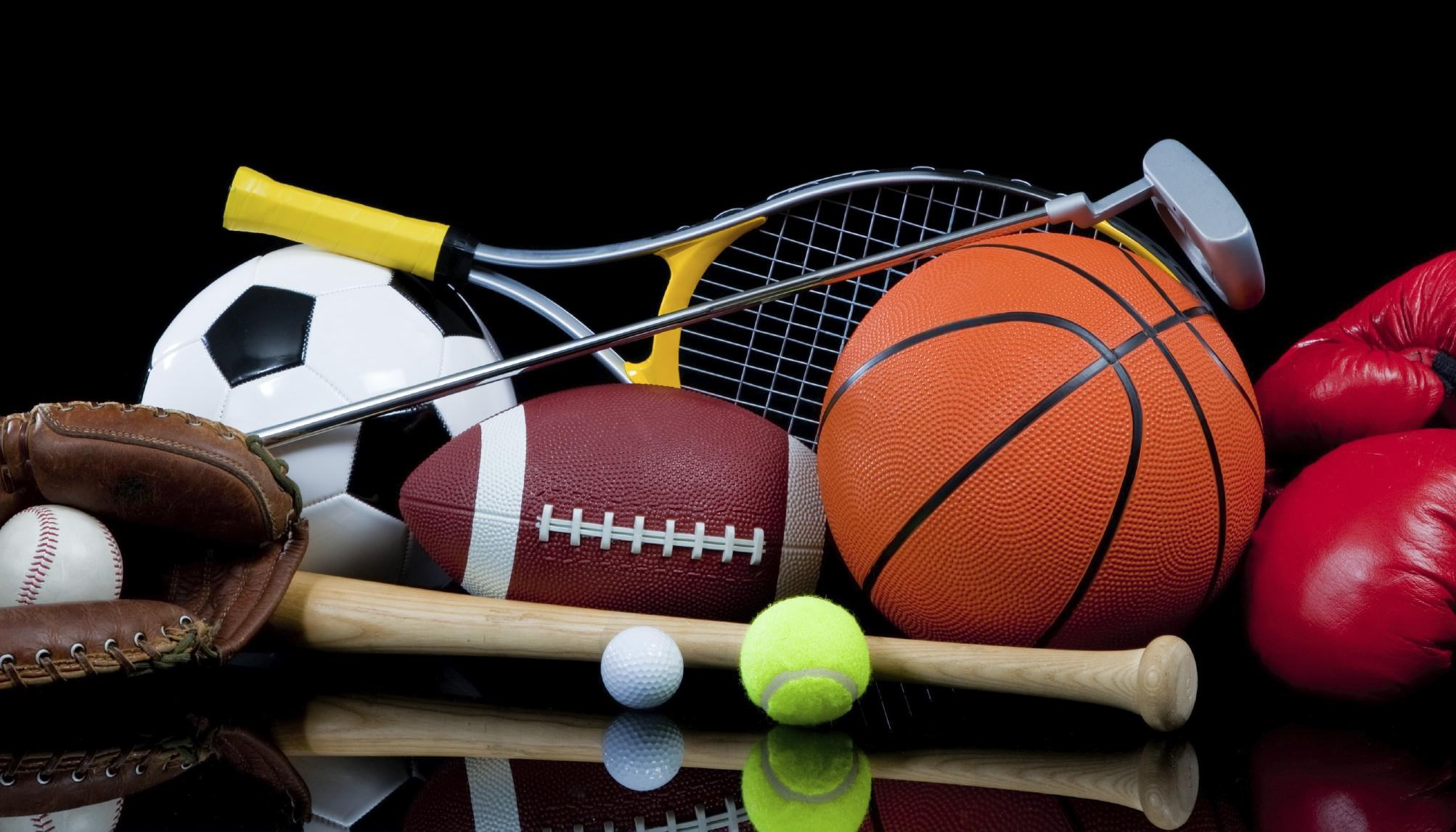 Collection of sports equipment on a black background HD Wallpaper