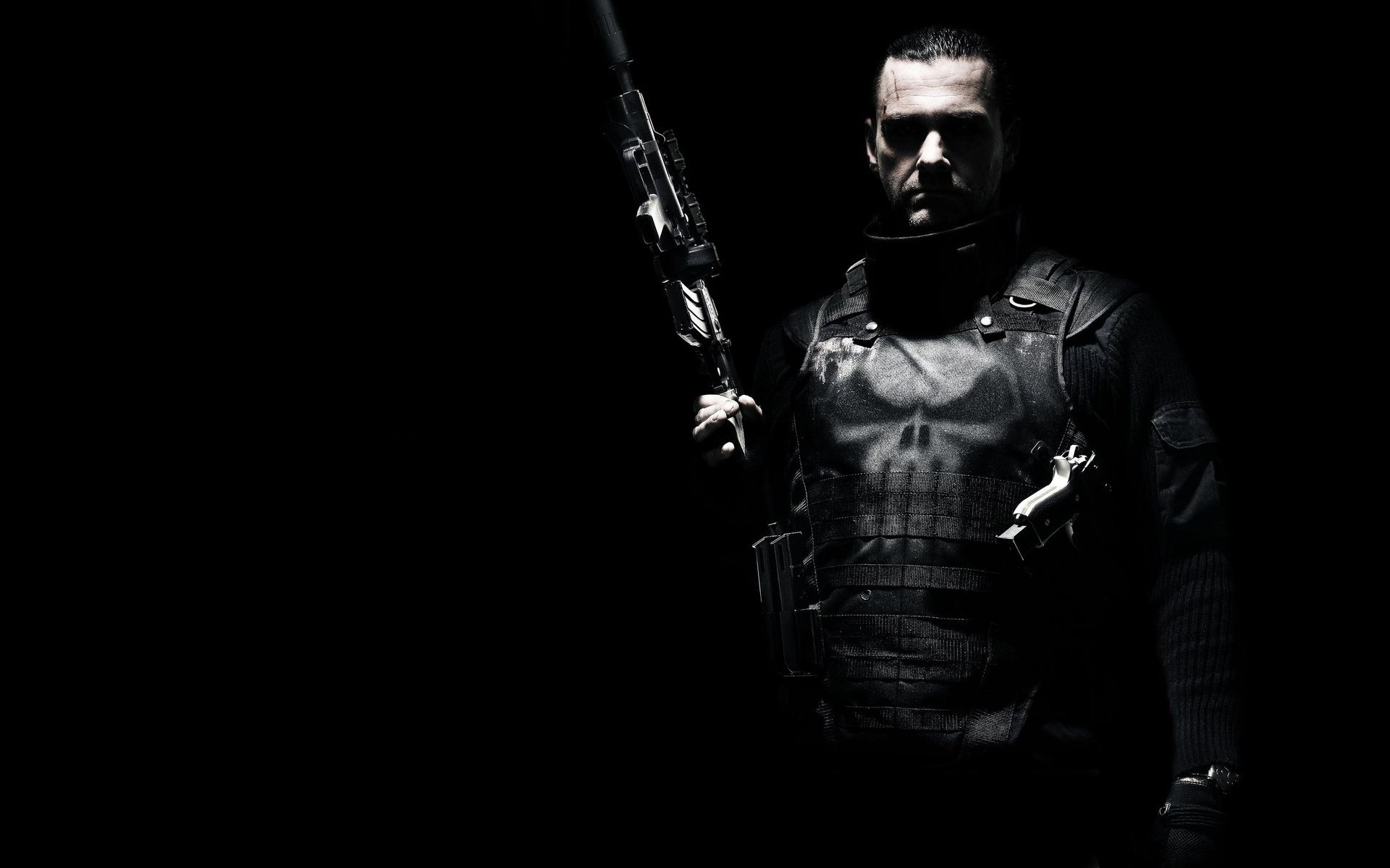The Punisher holding a rifle HD Wallpaper