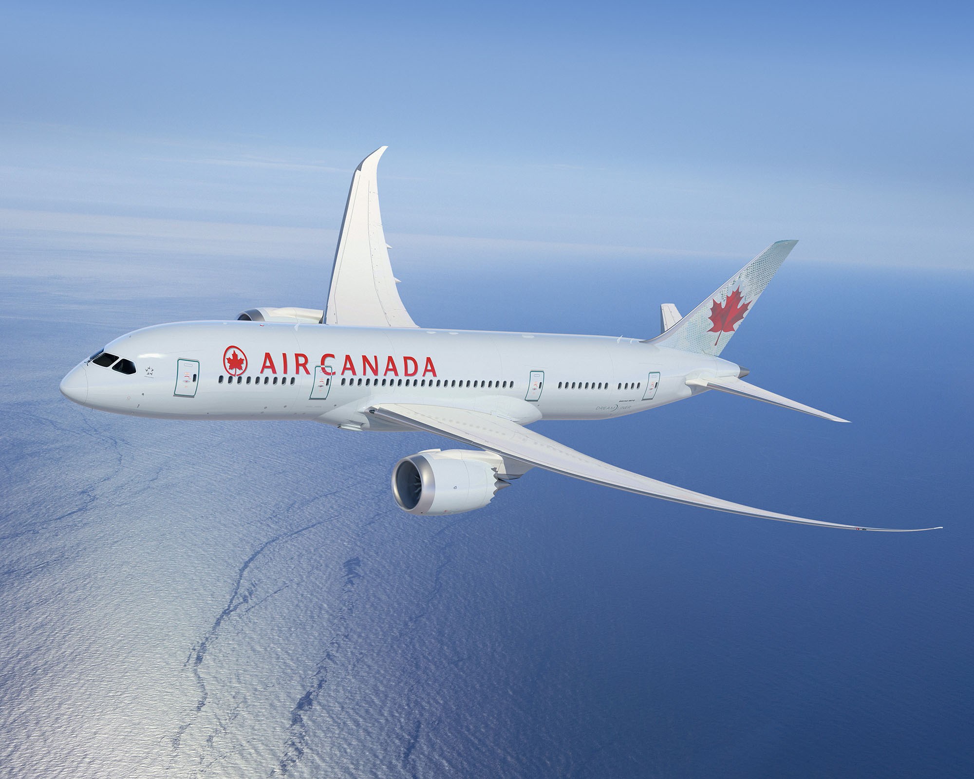 Air Canada Boeing 787 Dreamliner flying over the ocean HD Wallpaper