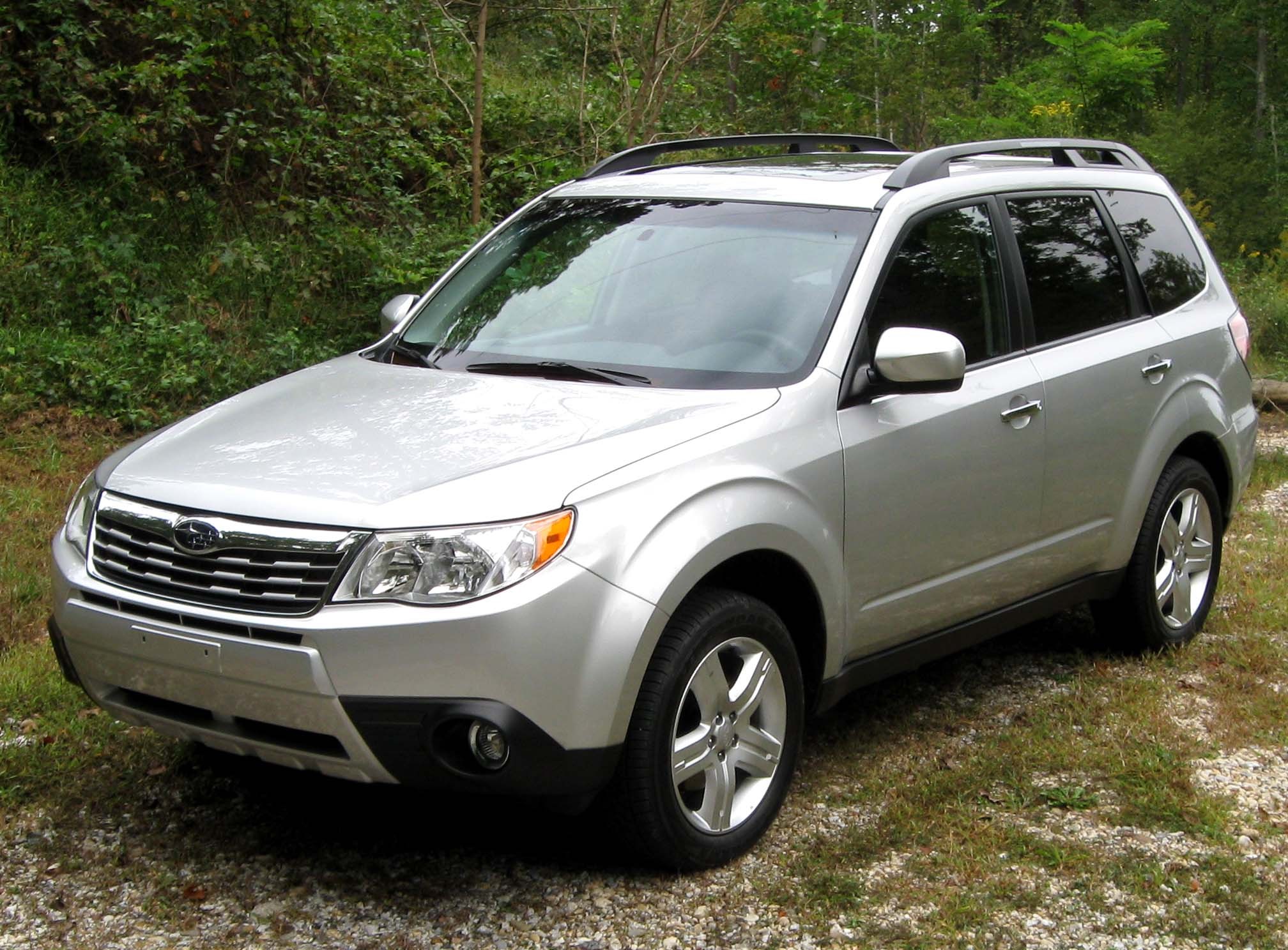 Silver Subaru Forester parked outdoors HD Wallpaper