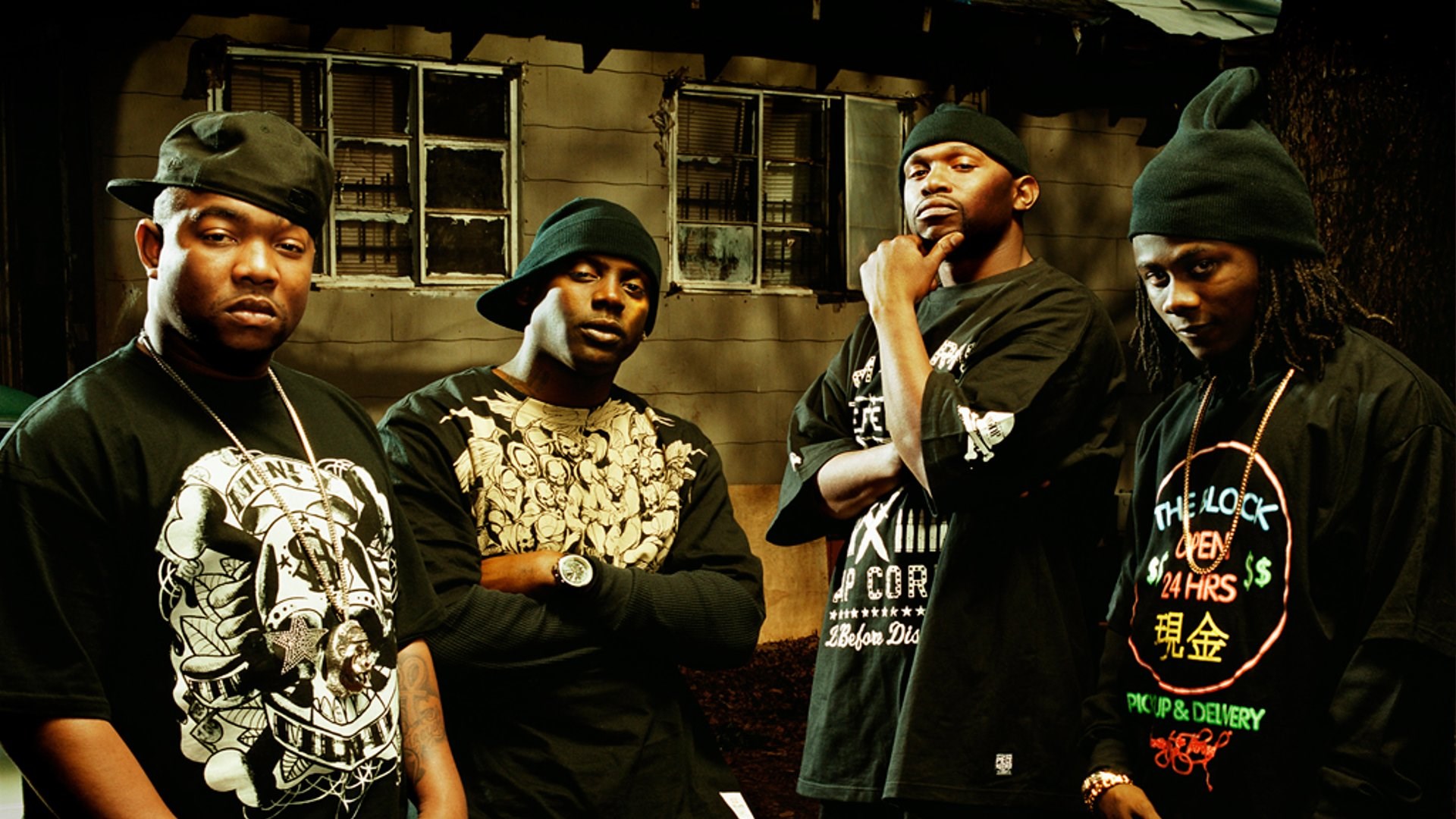 Four men in black beanies and t-shirts HD Wallpaper