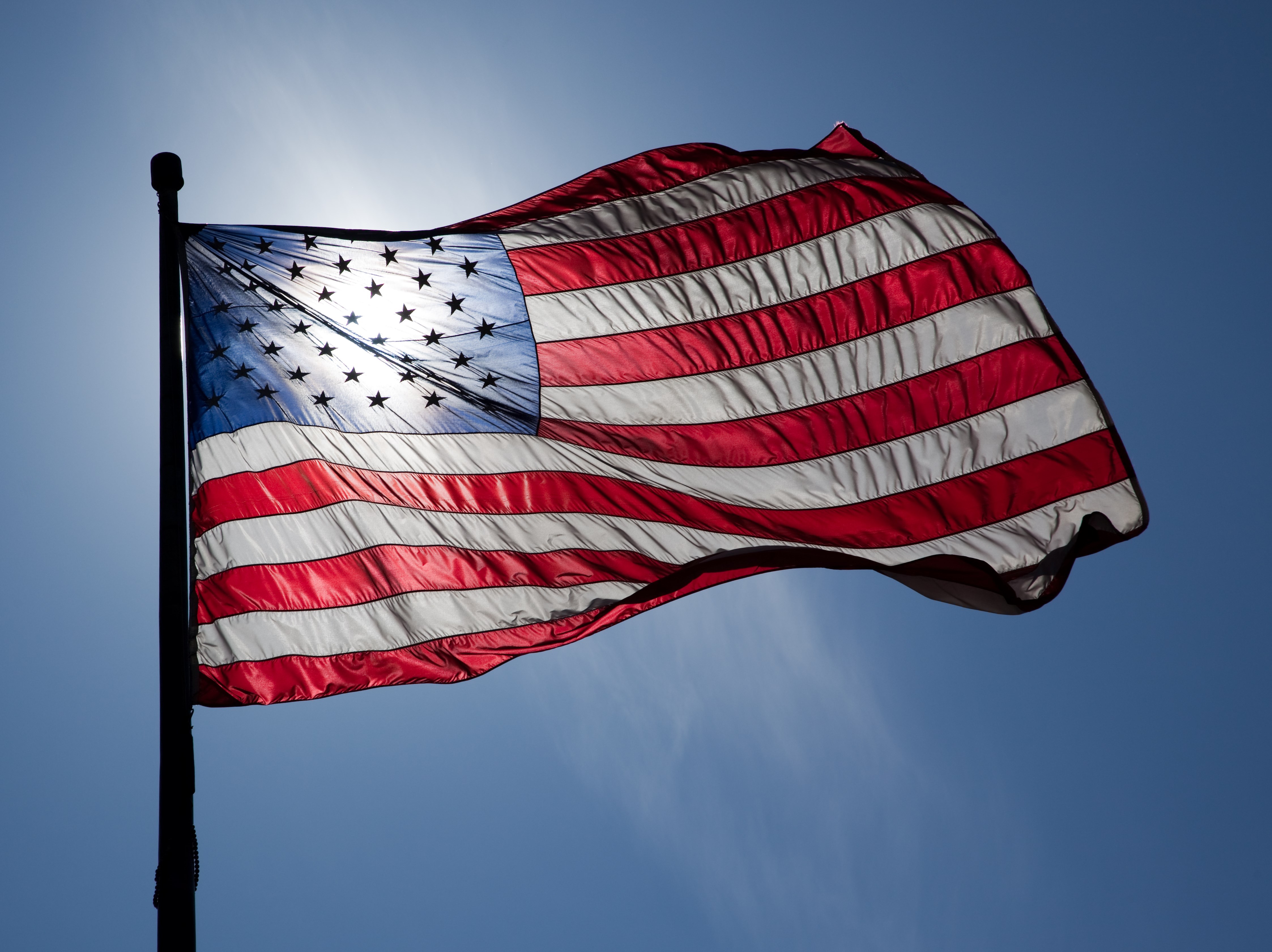 American flag waving in the sun HD Wallpaper