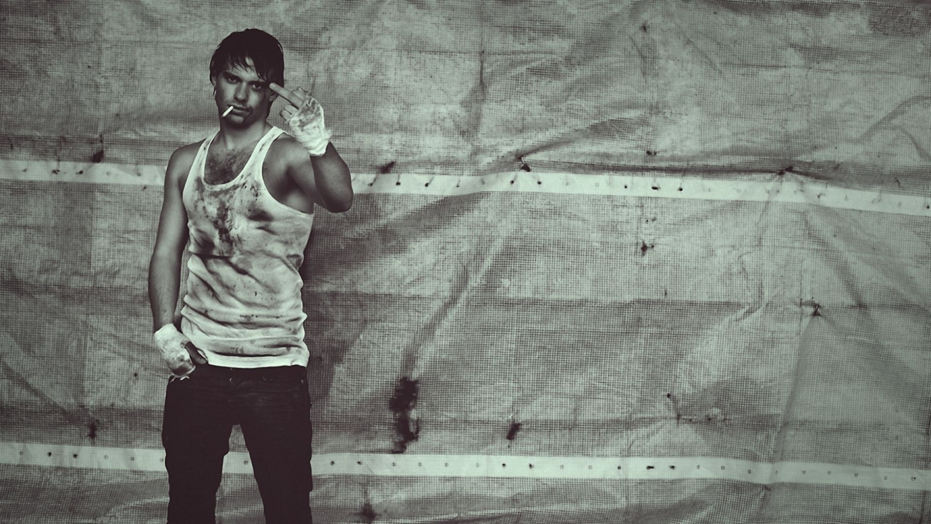 Man in dirty tank top with cigarette and boxing wraps HD Wallpaper