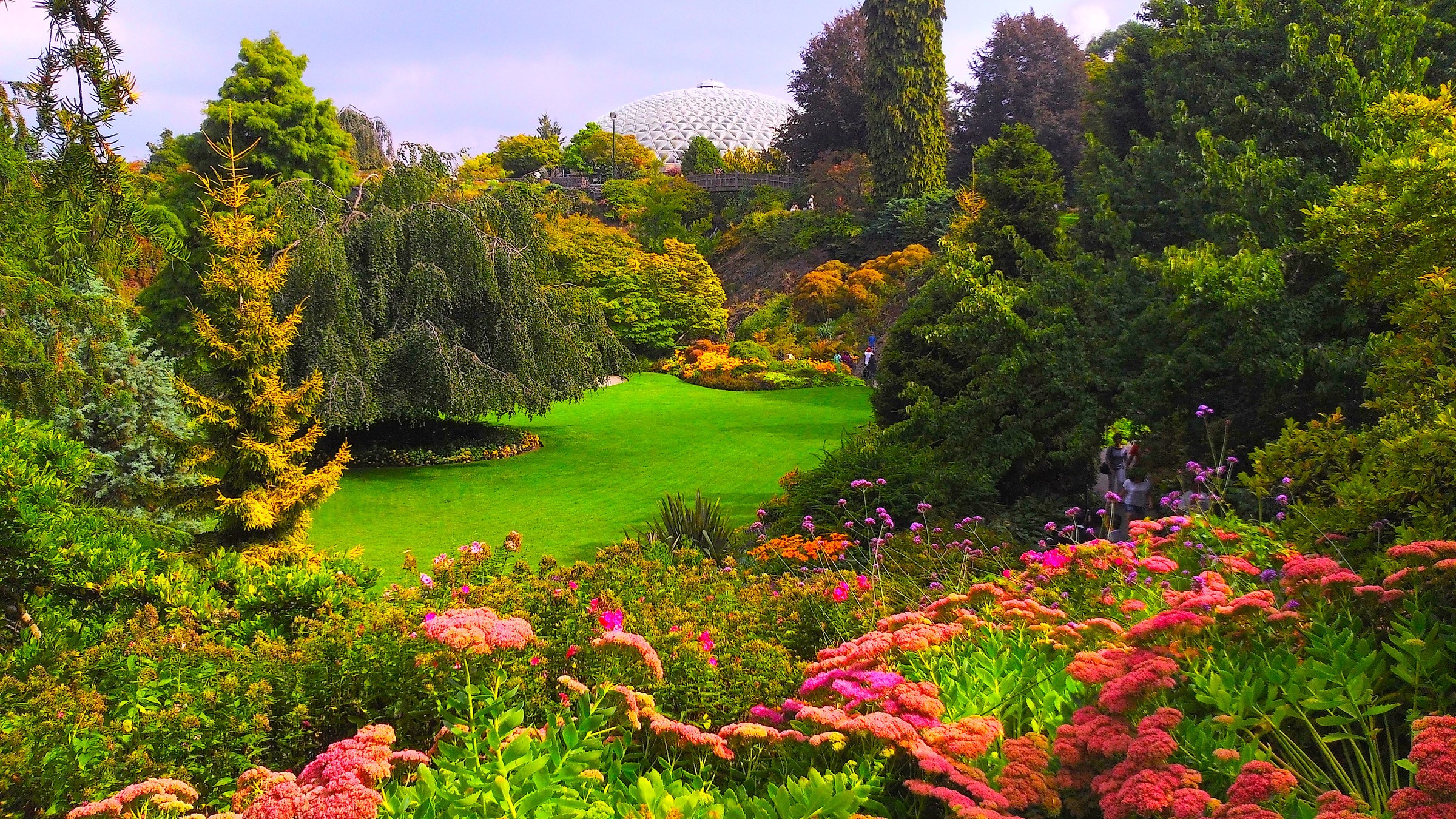 Beautiful garden with a geodesic dome in the background HD Wallpaper