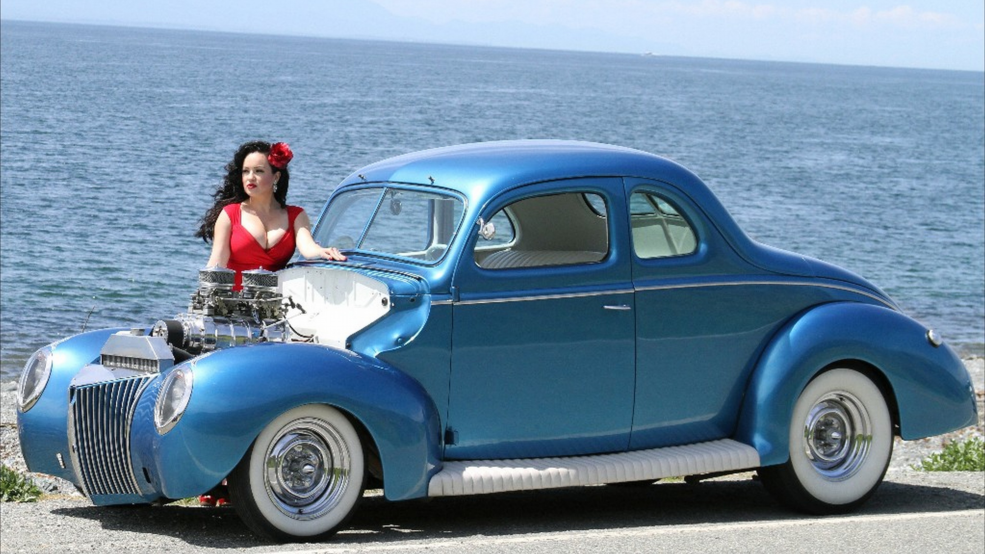 Woman in red dress with blue hot rod car HD Wallpaper