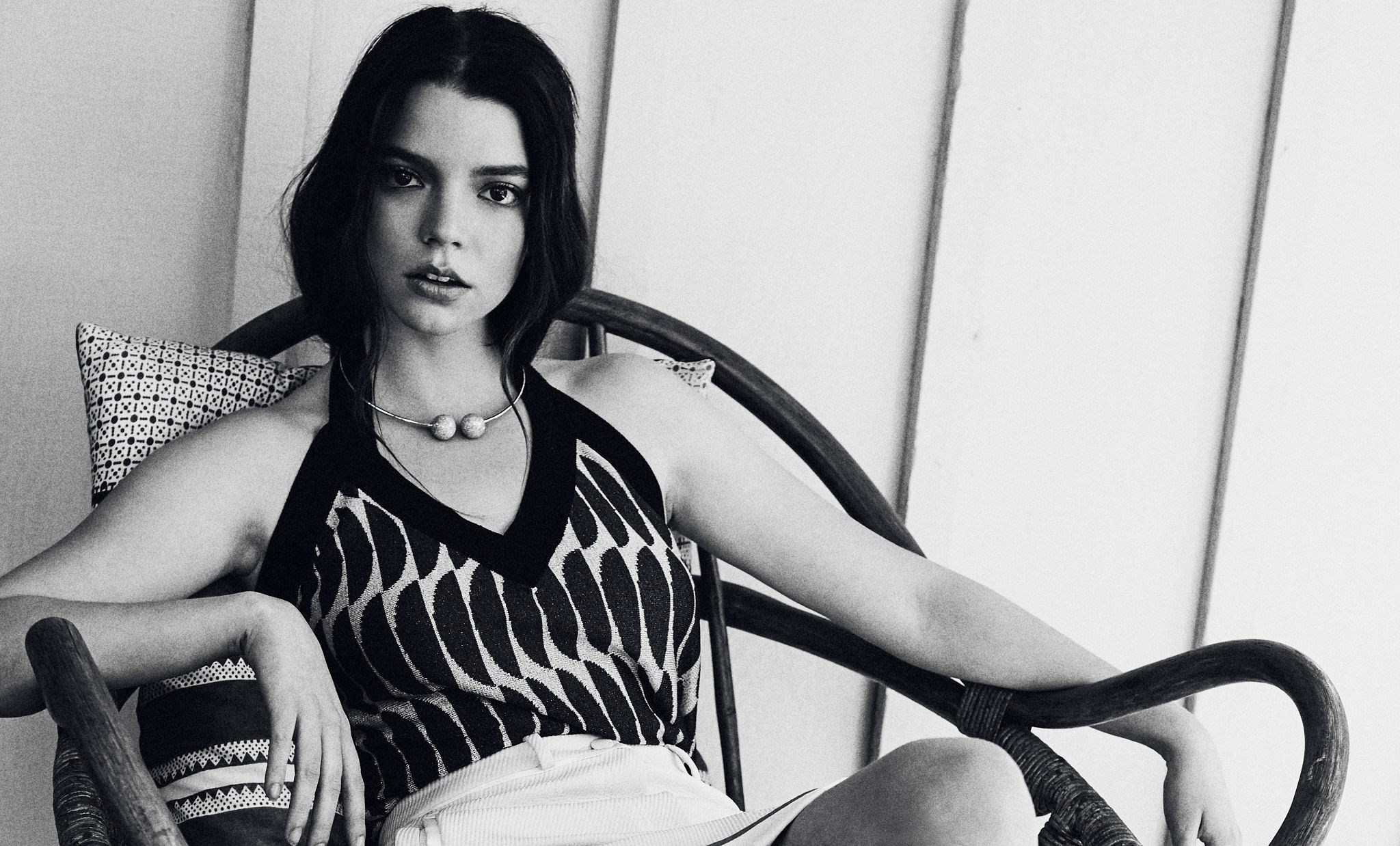 Anya Taylor-Joy sitting in a chair HD Wallpaper