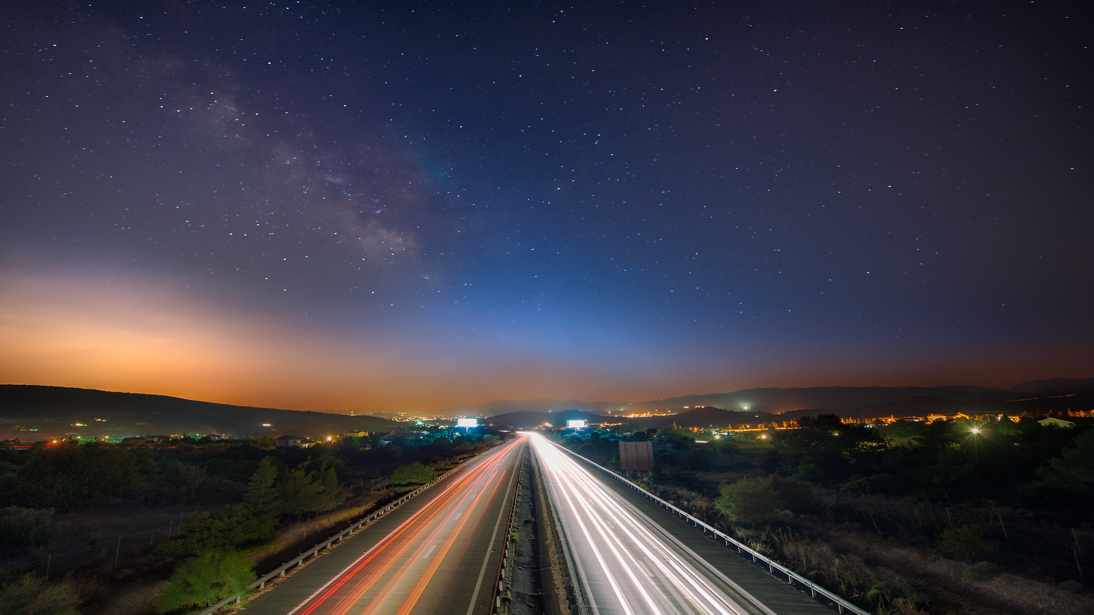 4K Highway Light Trails Under Milky Way HD Wallpaper