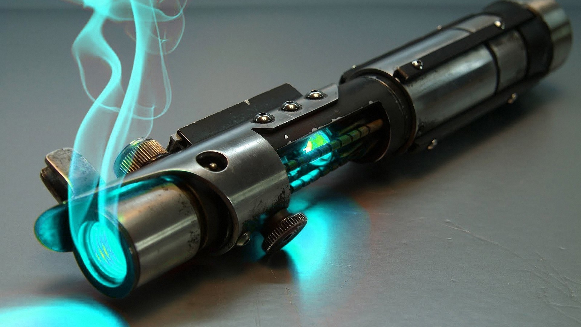 Lightsaber with blue smoke HD Wallpaper