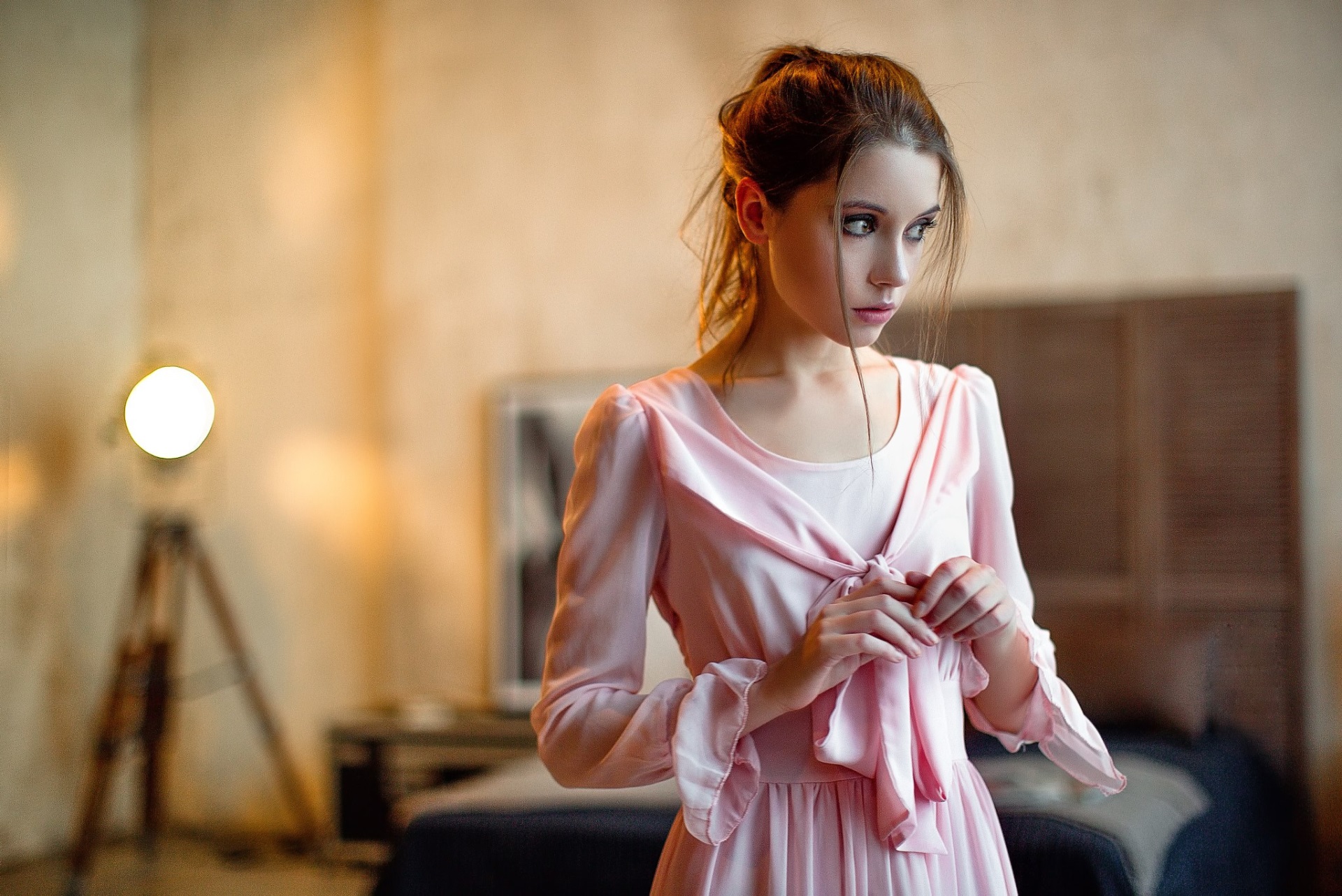 Woman in Soft Pink Dress in Cozy Room HD Wallpaper