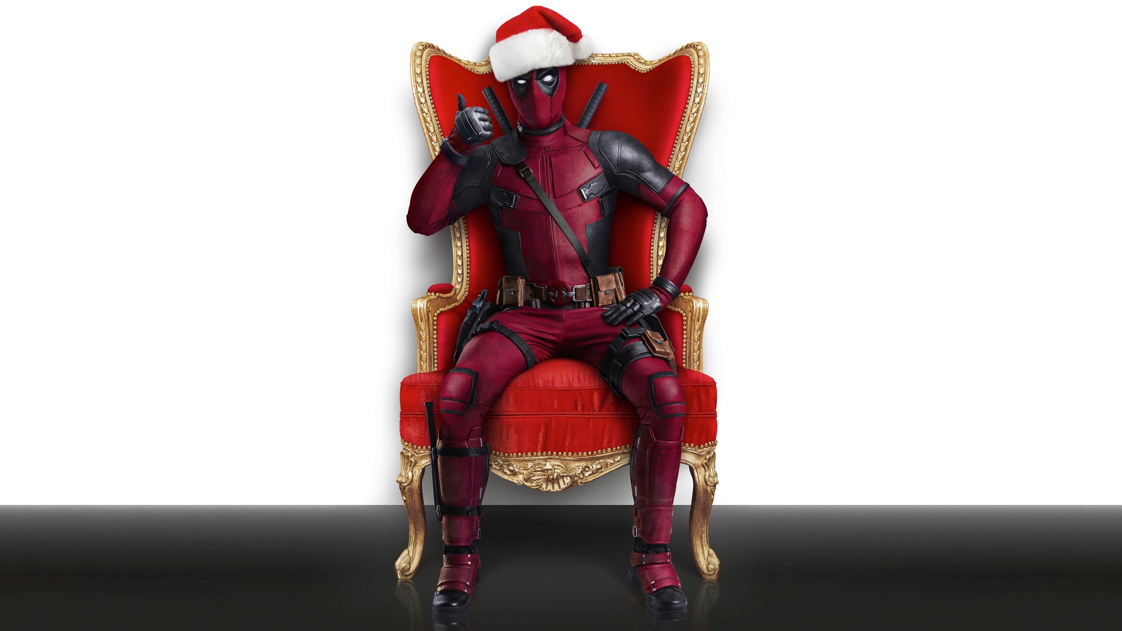 Deadpool in Santa Hat Sitting on Throne 4K HD Wallpaper