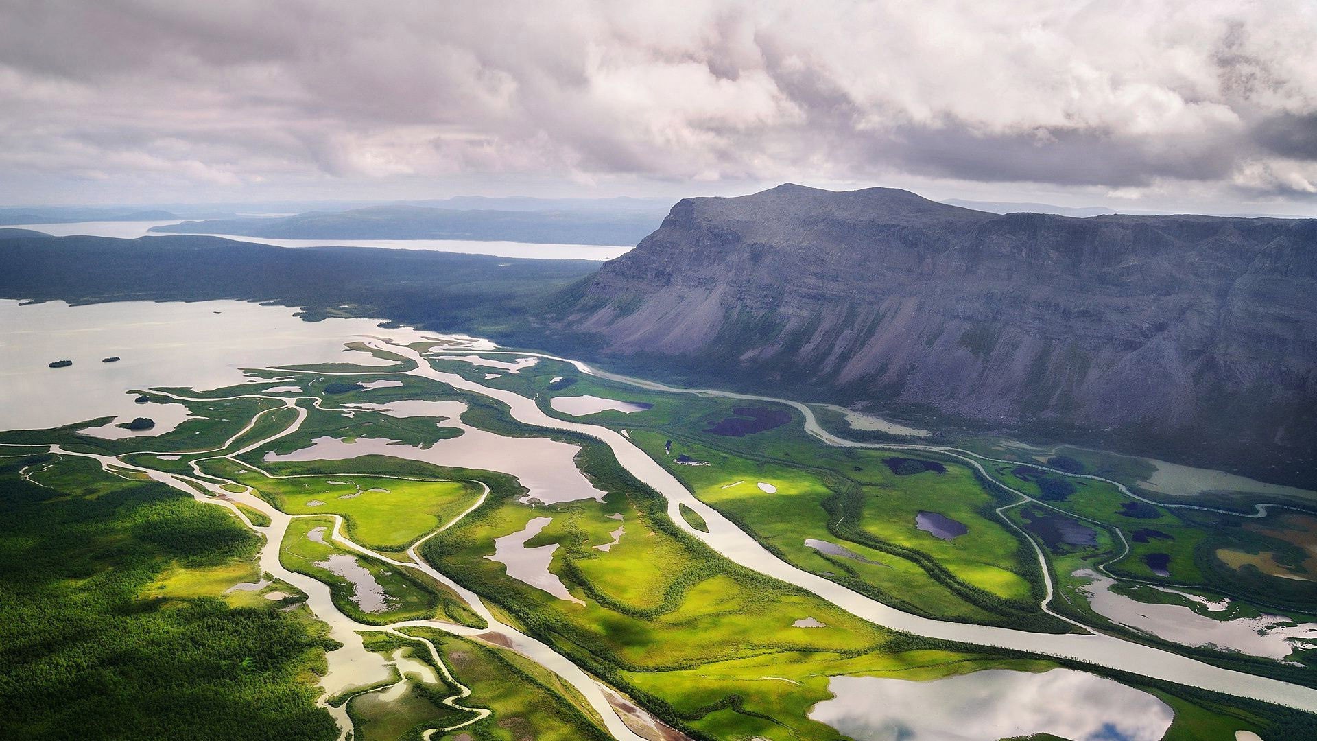 Aerial view of a river delta and mountain in Sweden HD Wallpaper