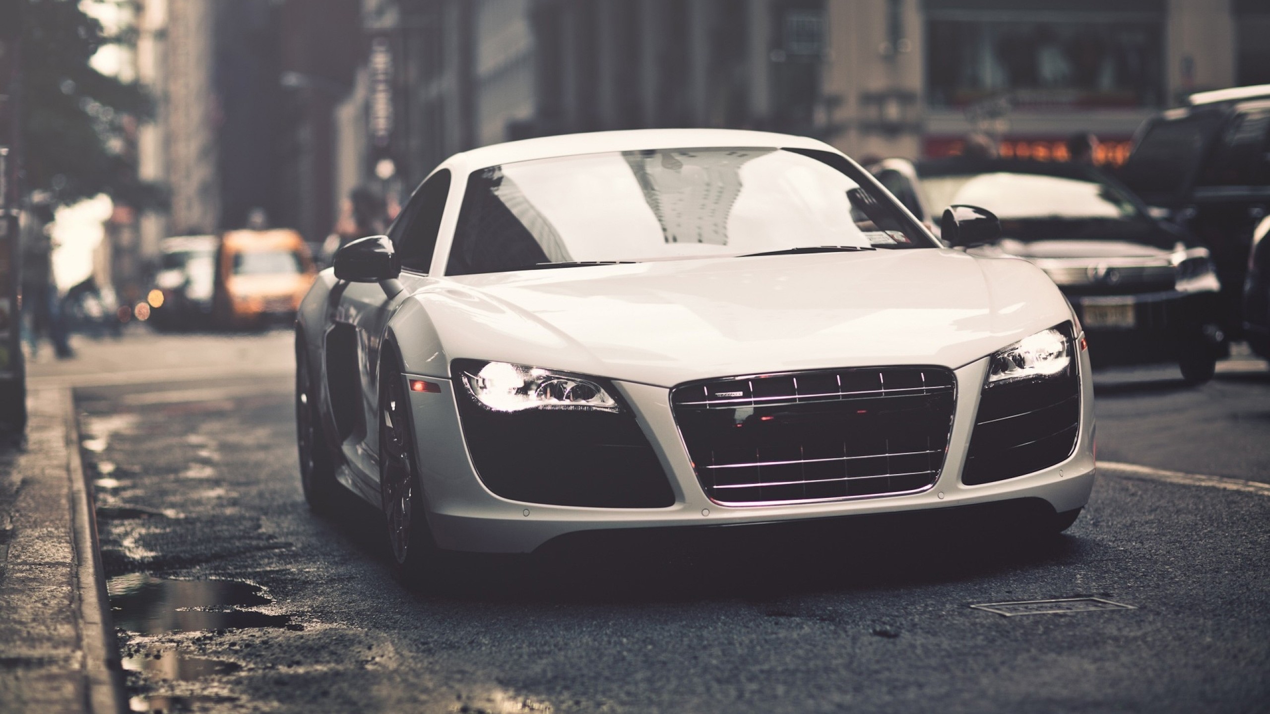 White Audi R8 parked on a wet city street HD Wallpaper