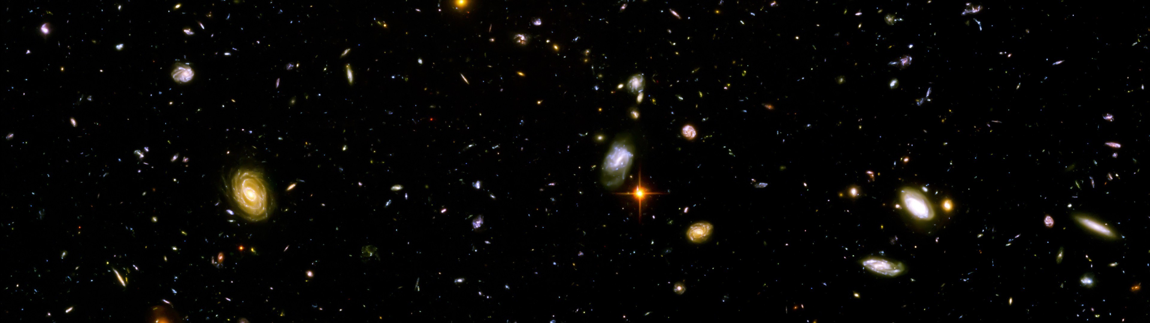 Hubble Deep Field galaxies in space HD Wallpaper