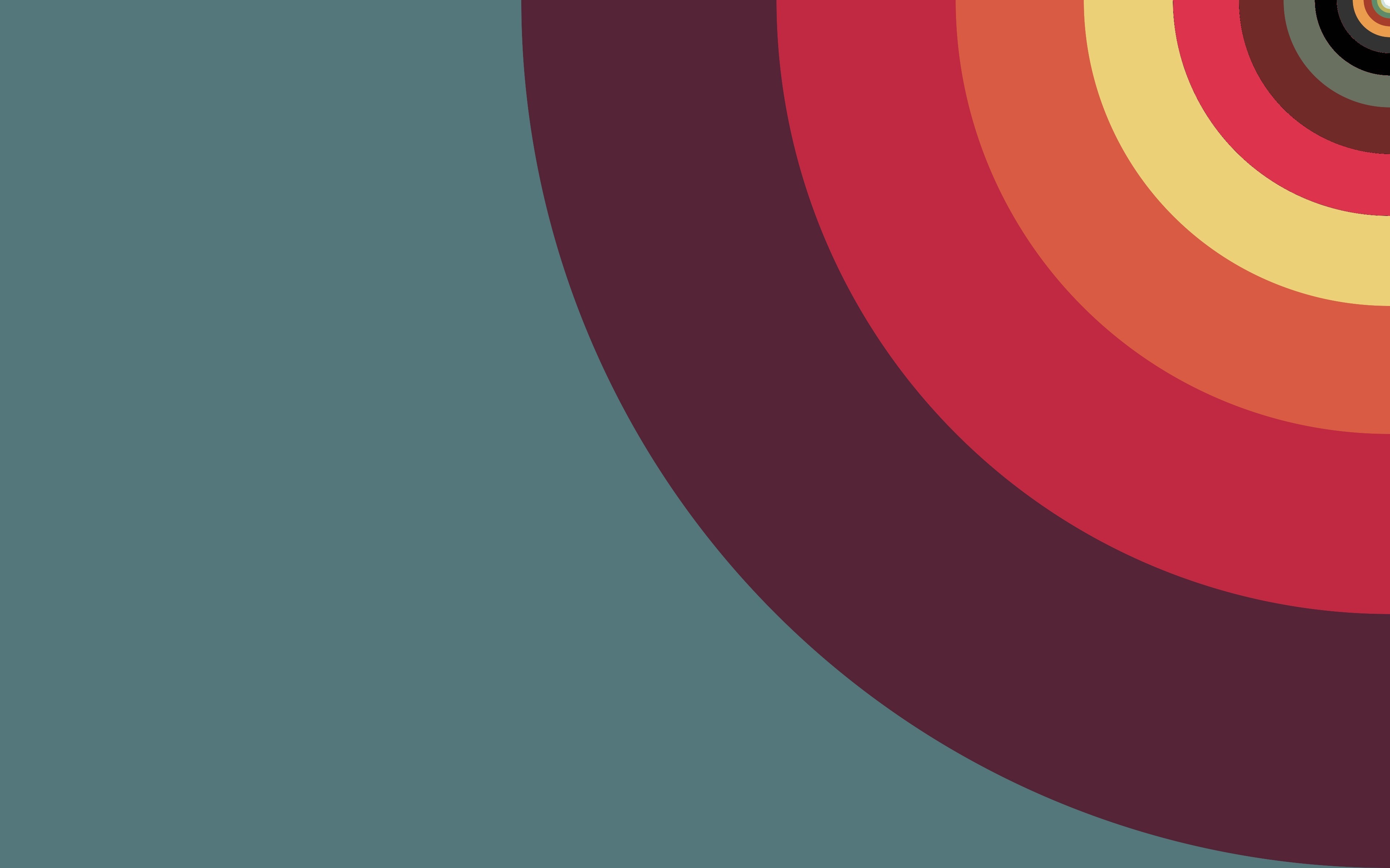 Abstract concentric circles in warm colors on a teal background HD Wallpaper