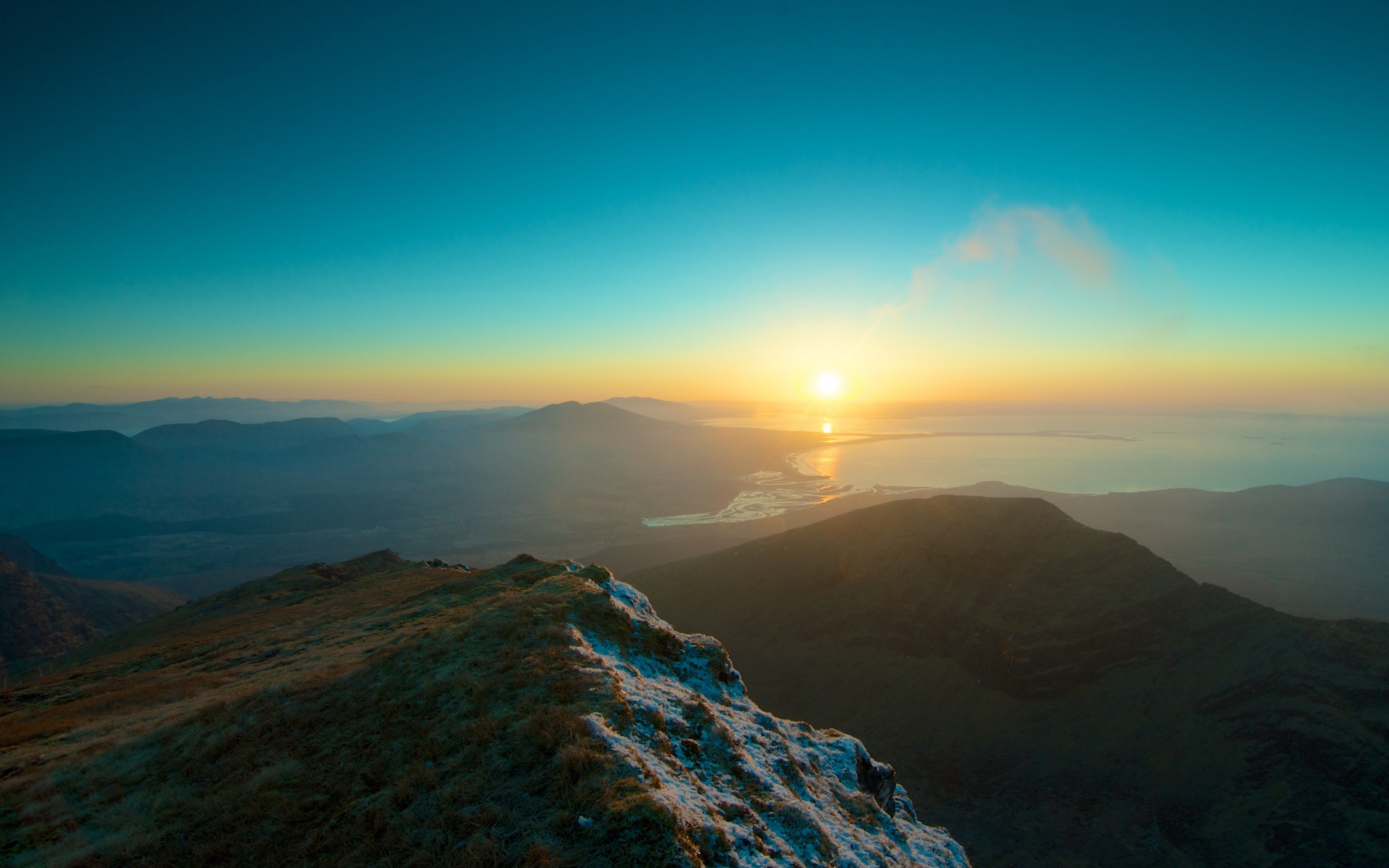 Mountain landscape with sunrise over a lake HD Wallpaper