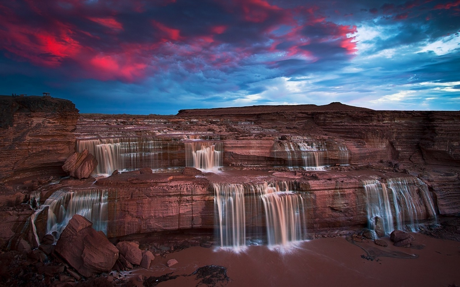 Waterfalls at sunset with red clouds in Arizona HD Wallpaper
