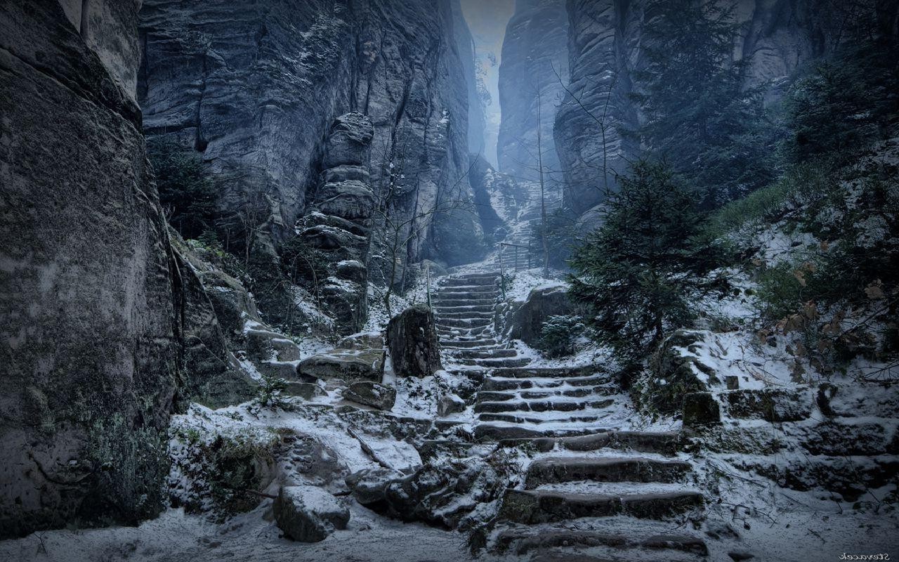 Snowy stone stairs in a rocky canyon HD Wallpaper