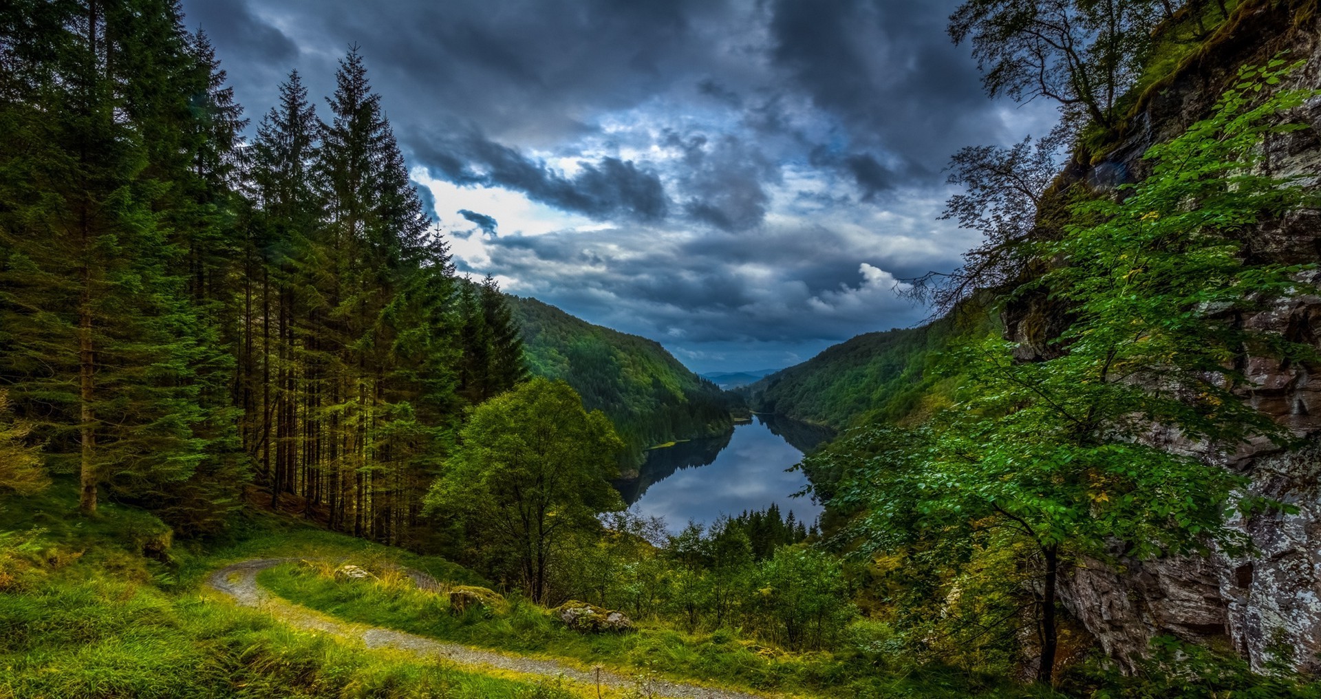 Lake in a forest valley under stormy clouds HD Wallpaper