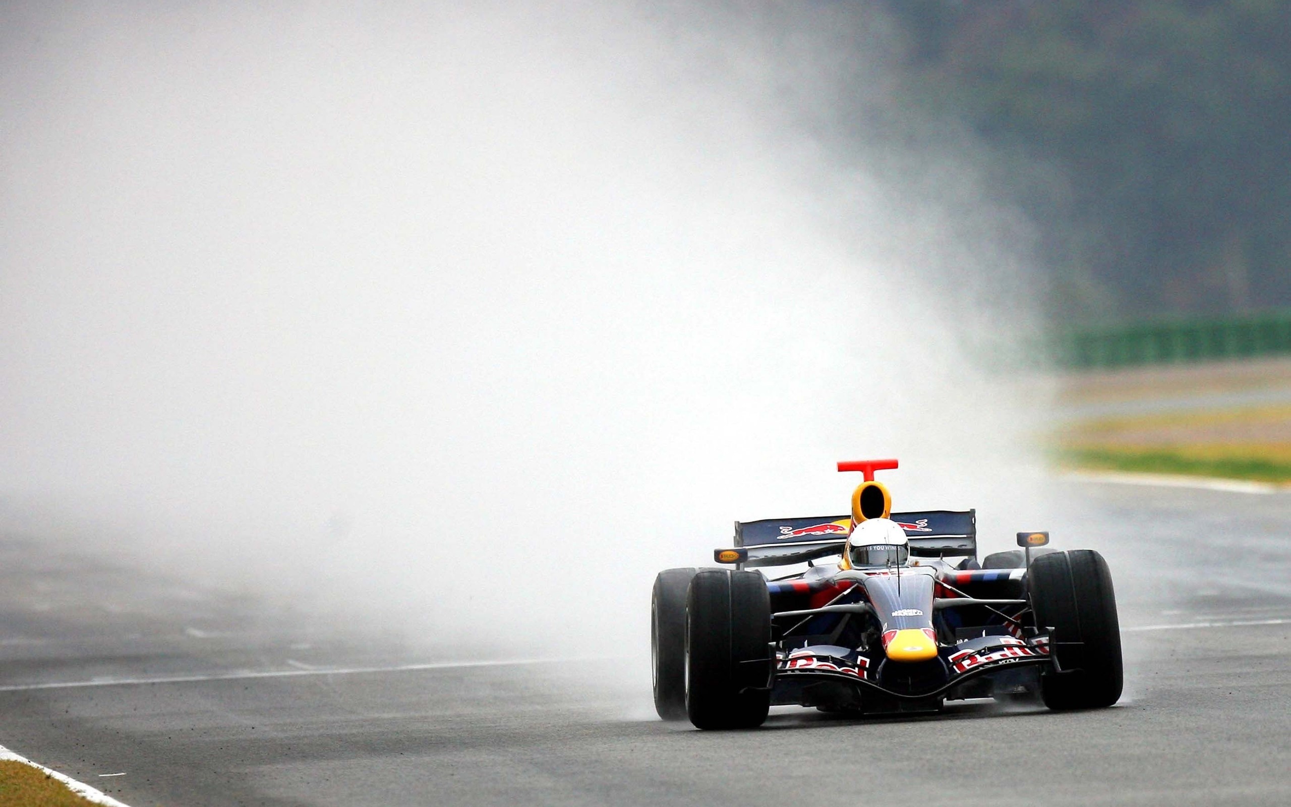 Red Bull Racing Formula 1 car on a wet track HD Wallpaper