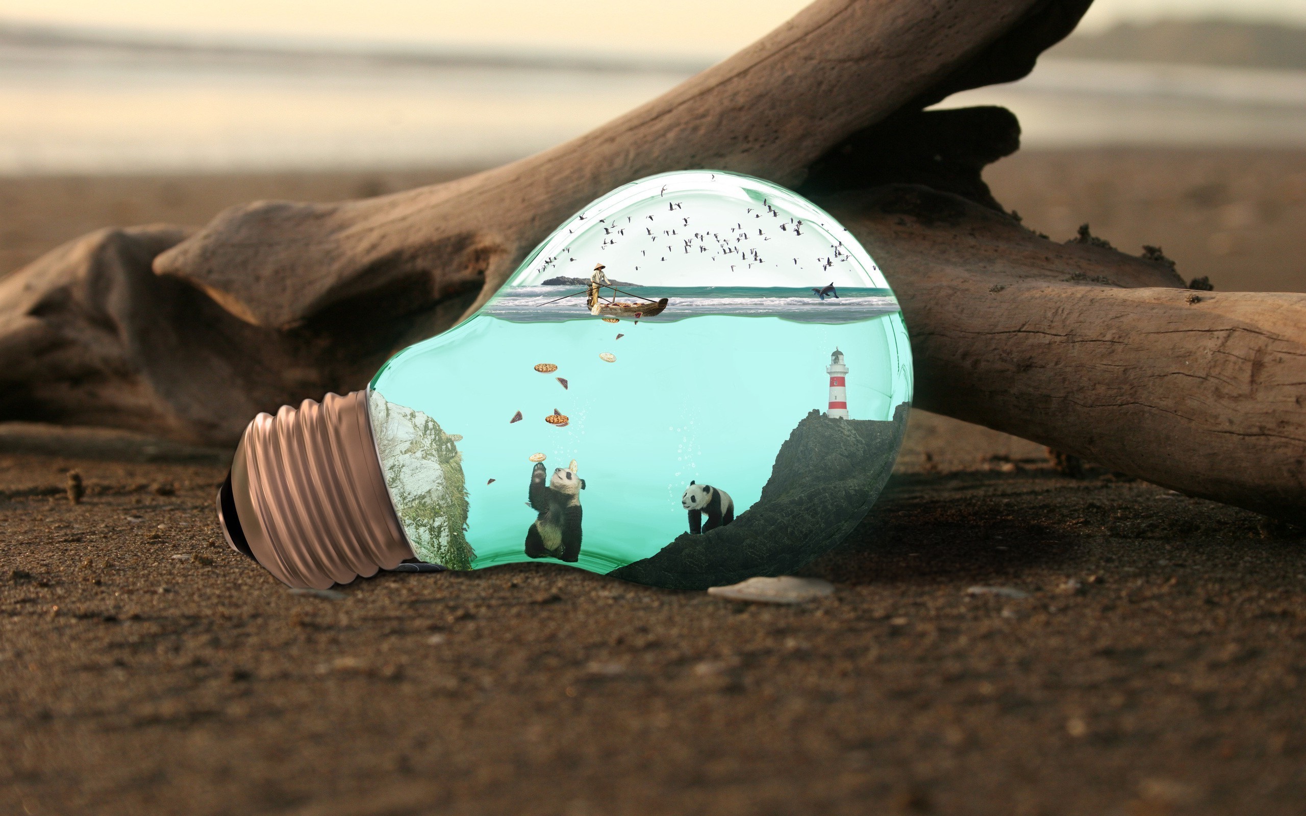 Light bulb with miniature world on a beach HD Wallpaper