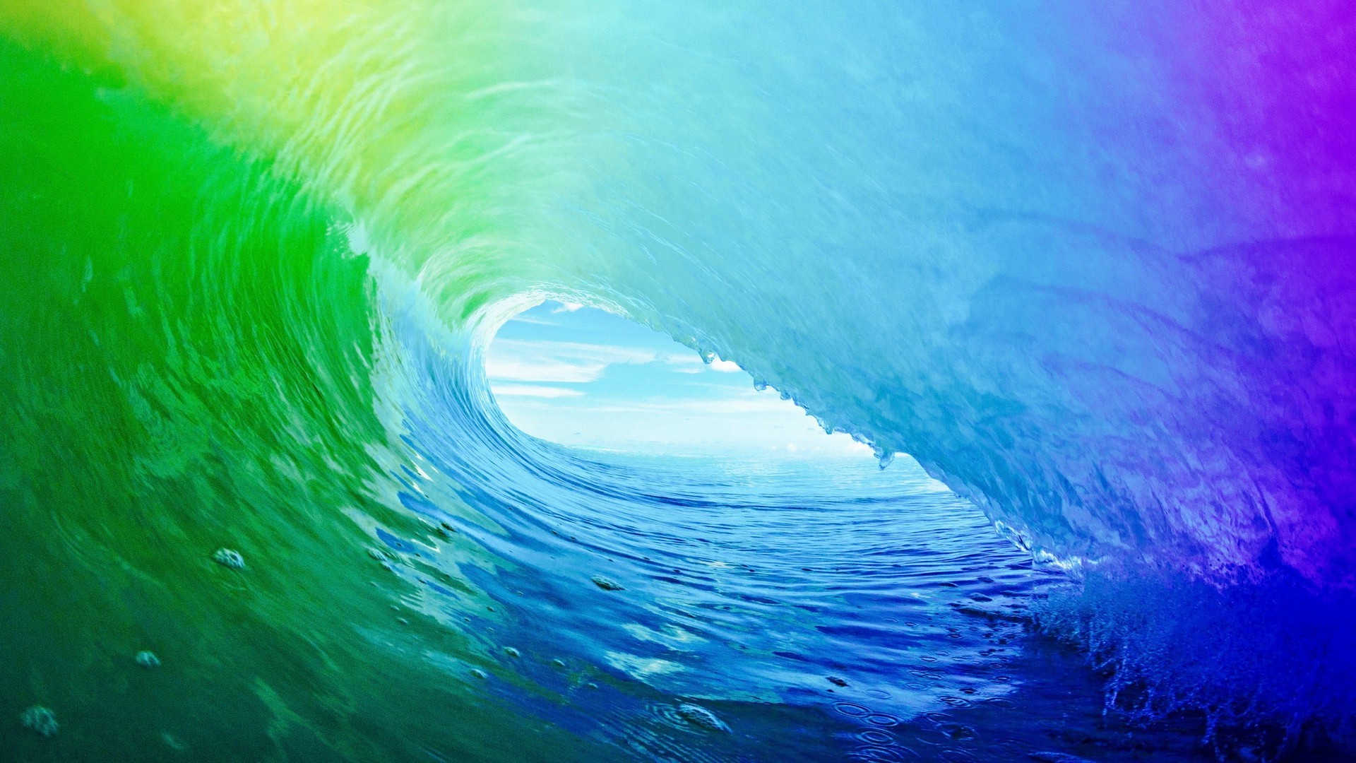 Colorful wave breaking with ocean and sky visible HD Wallpaper