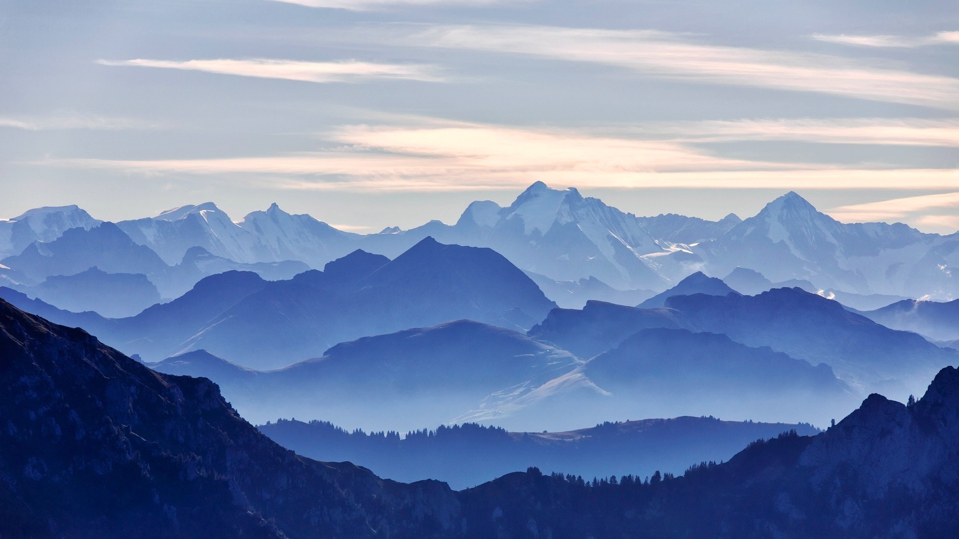 Blue mountain range with clouds HD Wallpaper