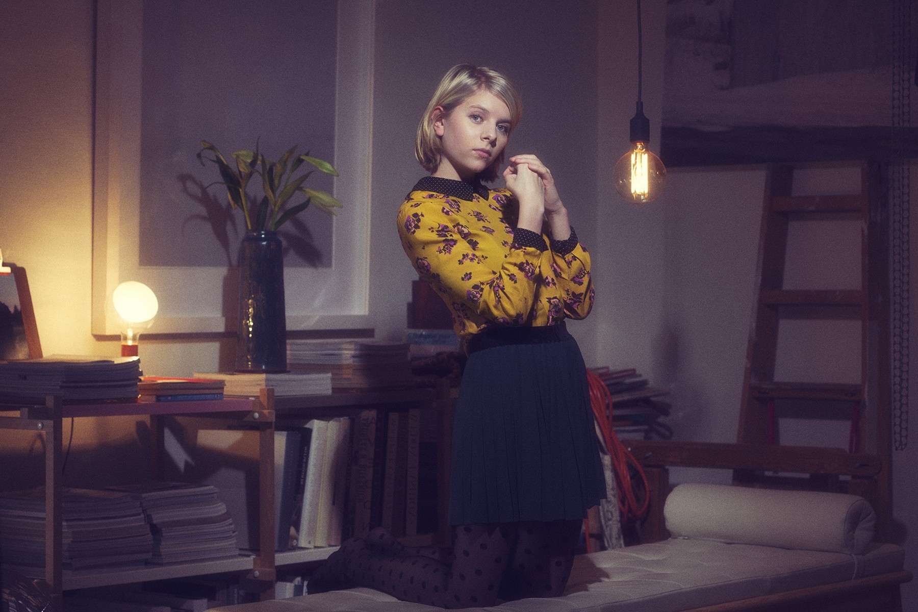 Aurora Aksnes kneeling in a room HD Wallpaper