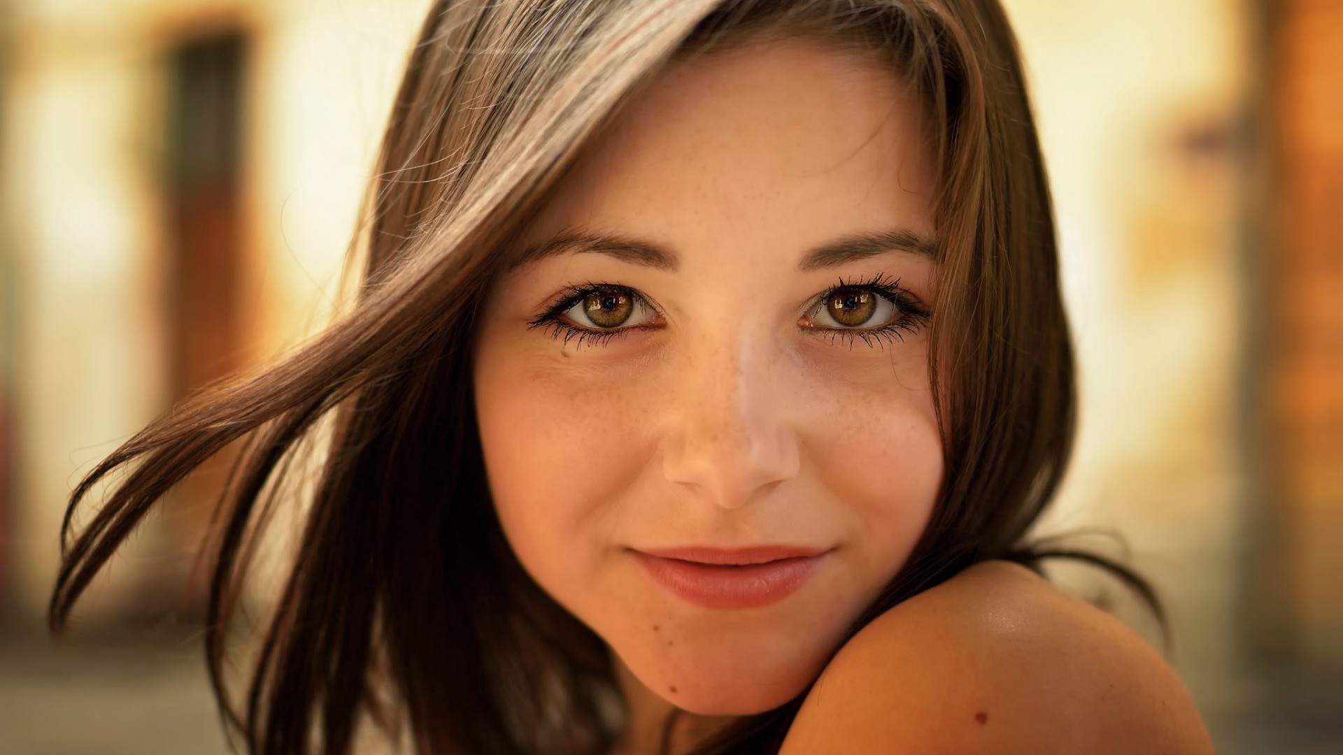 Portrait of a young woman with brown eyes HD Wallpaper