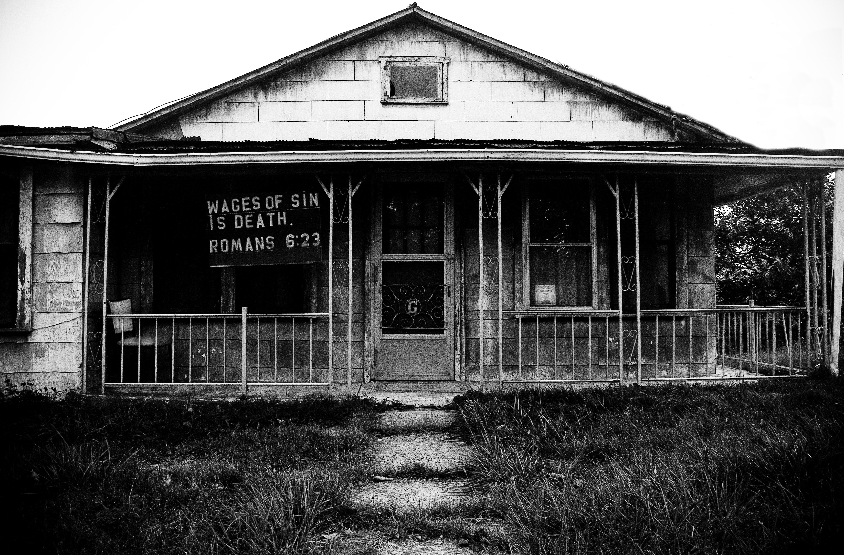 Abandoned house with religious sign HD Wallpaper