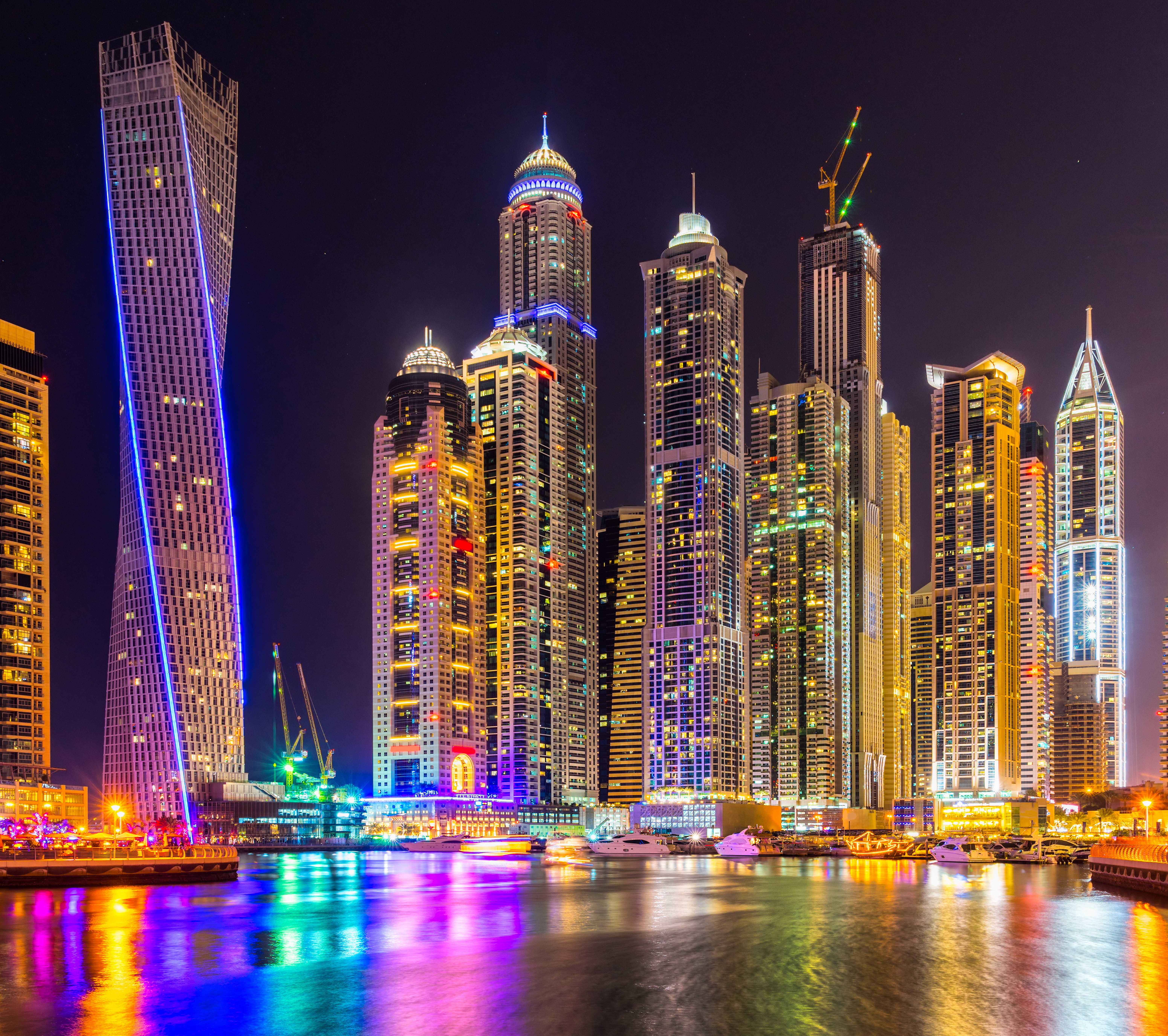 Dubai Marina skyscrapers at night with reflections HD Wallpaper