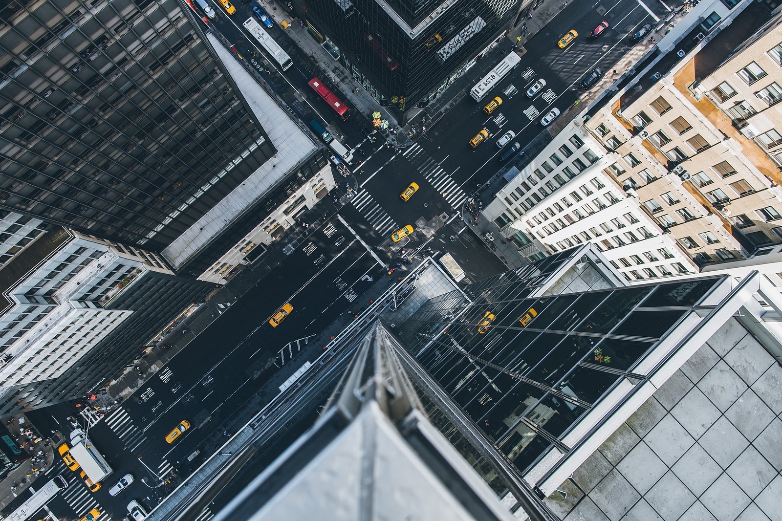 Aerial view of New York City street with taxis and buildings HD Wallpaper