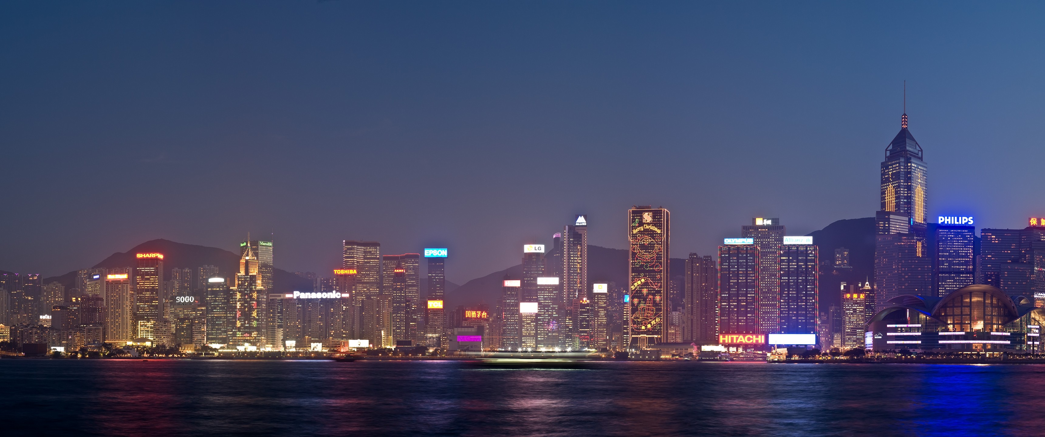 Hong Kong skyline at night with neon lights HD Wallpaper
