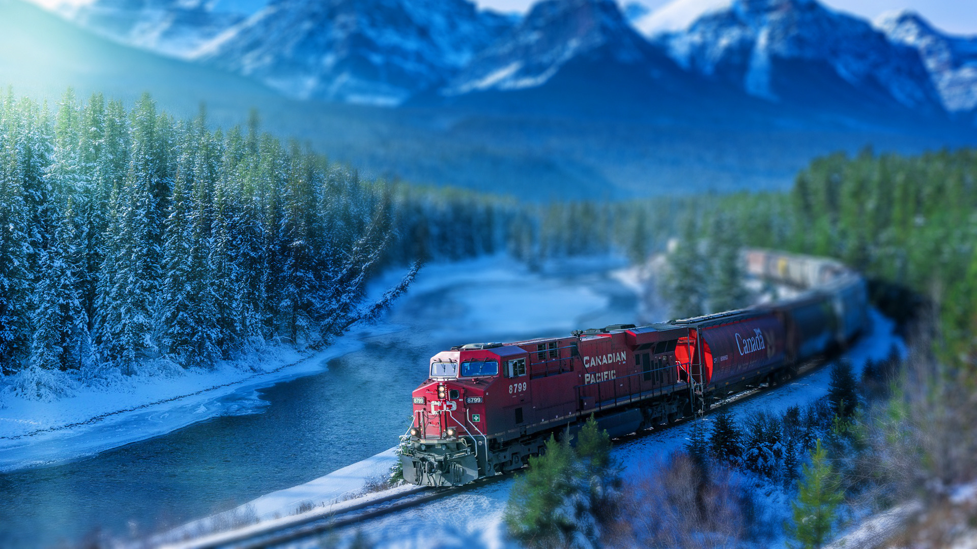Canadian Pacific train in a snowy mountain landscape HD Wallpaper