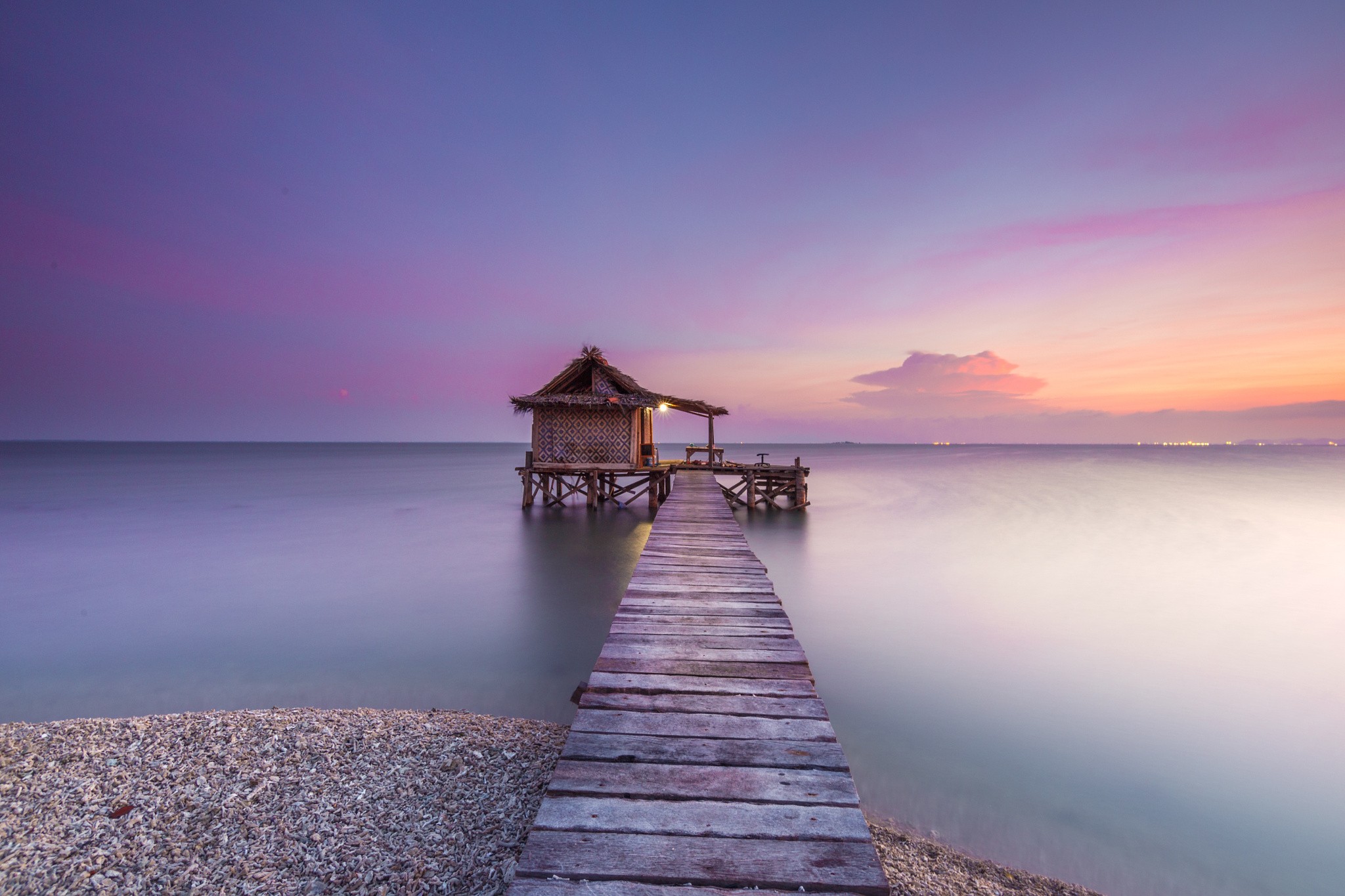 Seaside Wooden Pier Leading to a Small House at Sunset HD Wallpaper