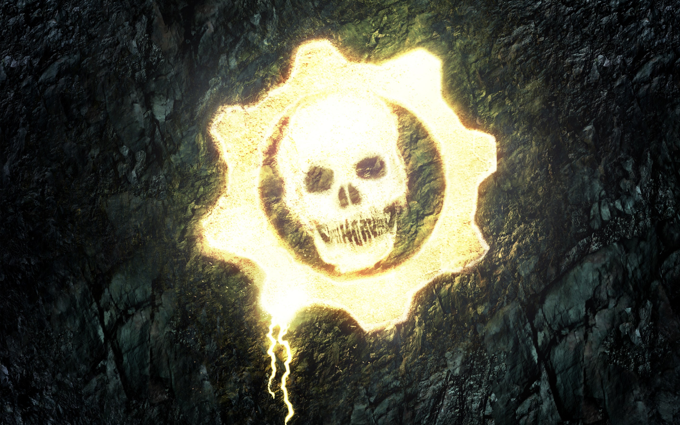 Gears of War skull logo on rocky surface HD Wallpaper