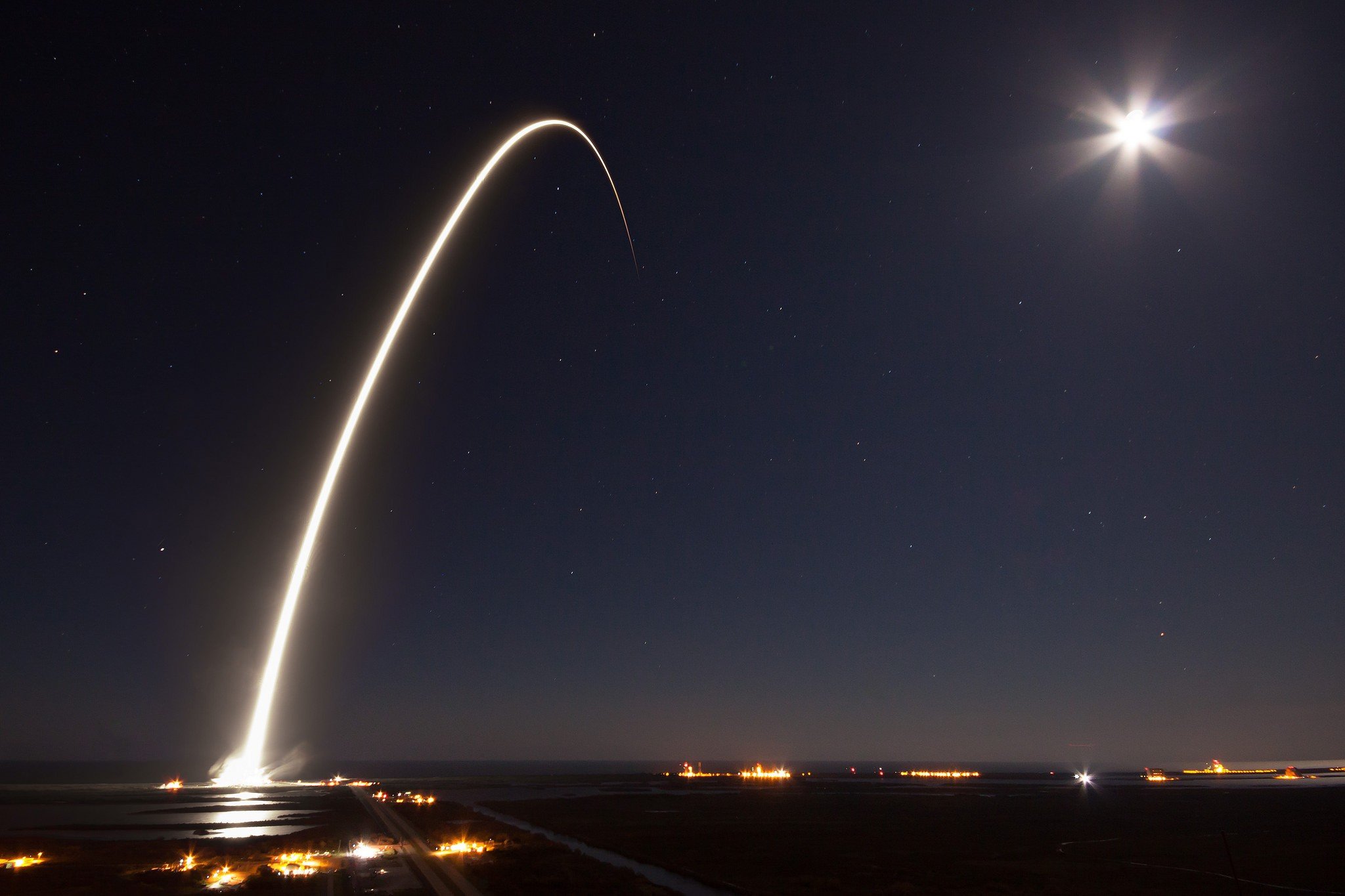 SpaceX rocket launch with moon and stars HD Wallpaper