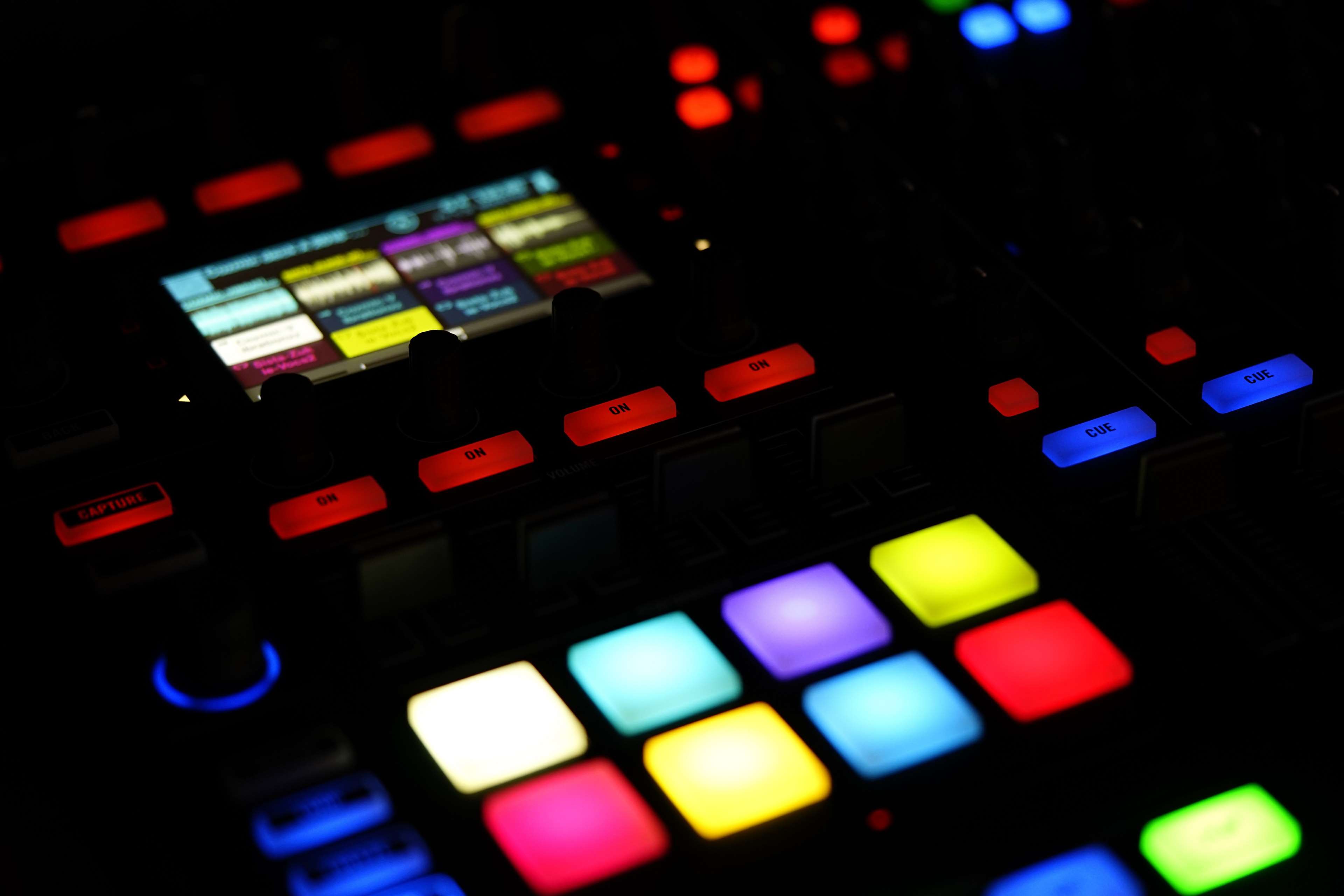 DJ controller with illuminated buttons and screen HD Wallpaper