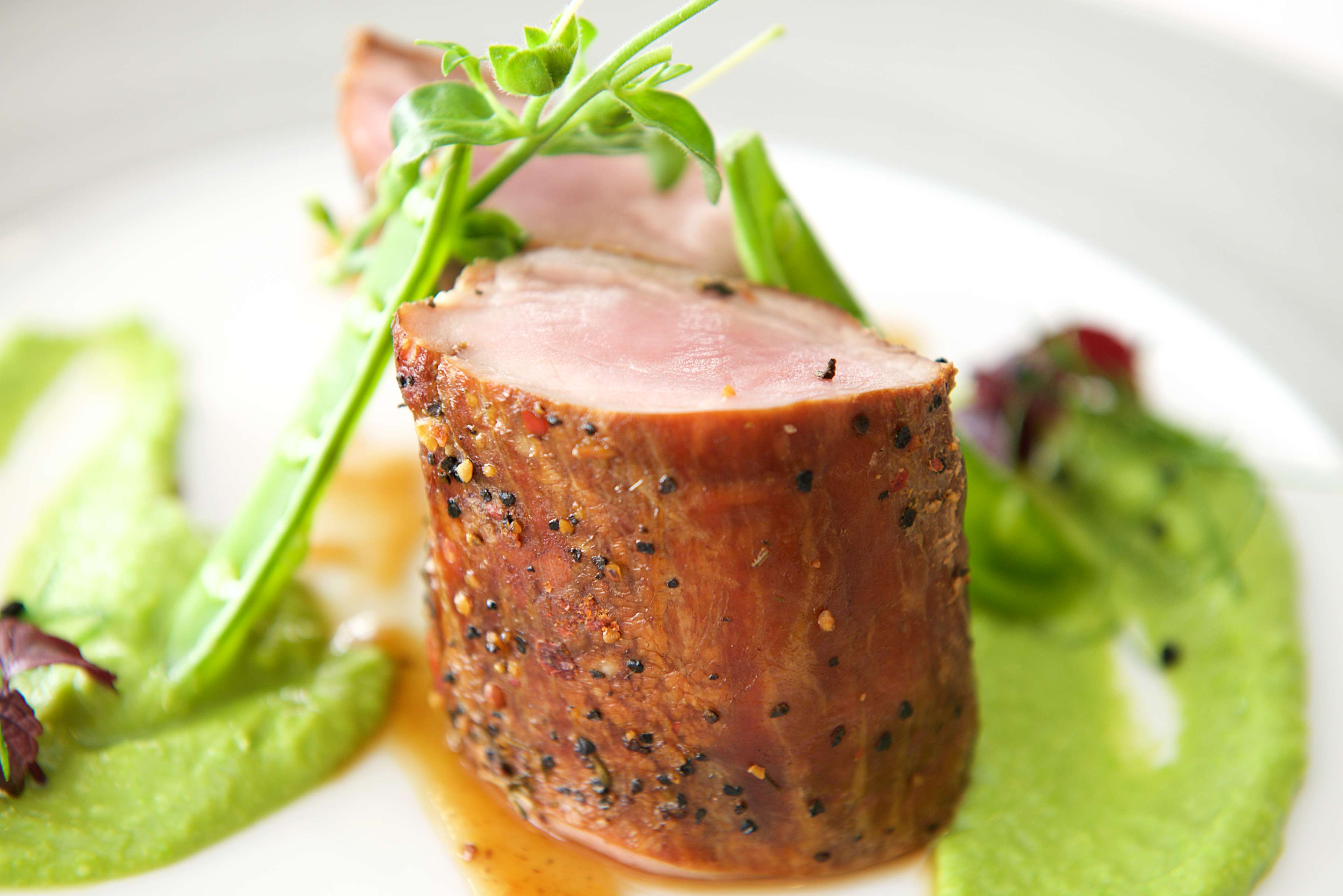 Pork Tenderloin with Pea Puree and Greens HD Wallpaper