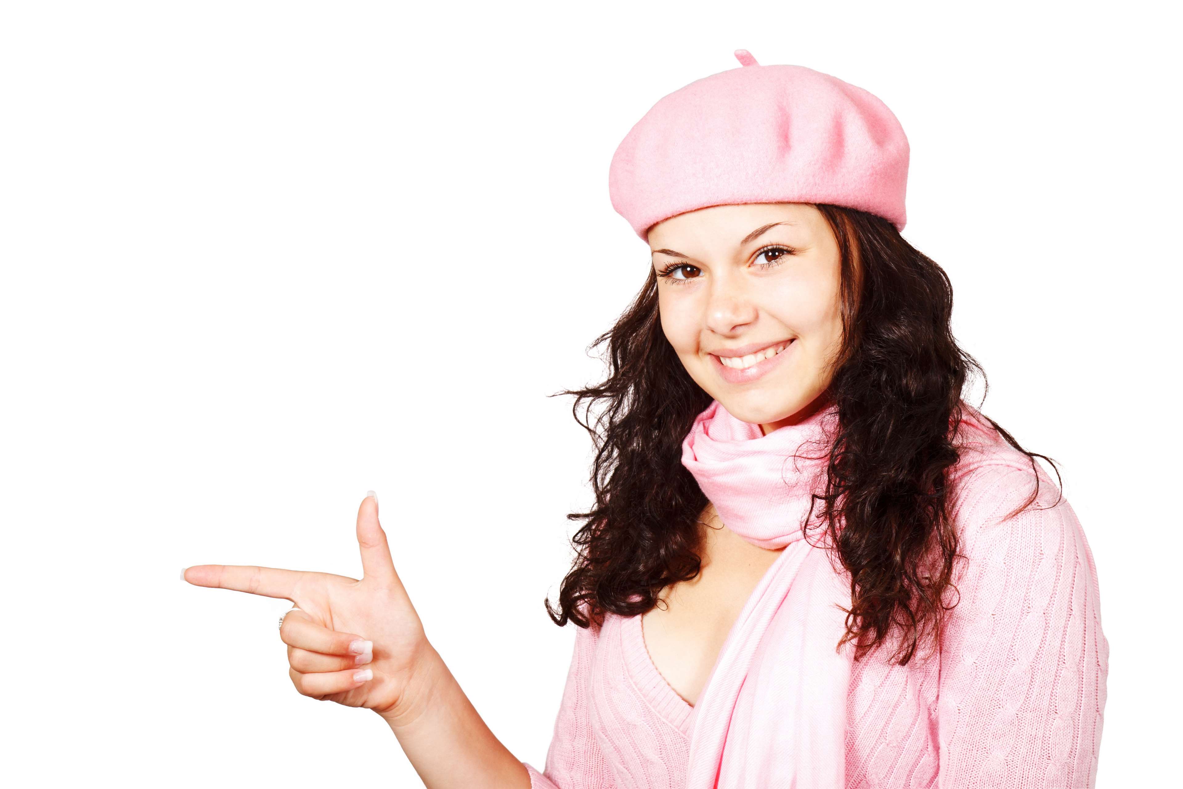 Young woman in pink beret and scarf pointing HD Wallpaper