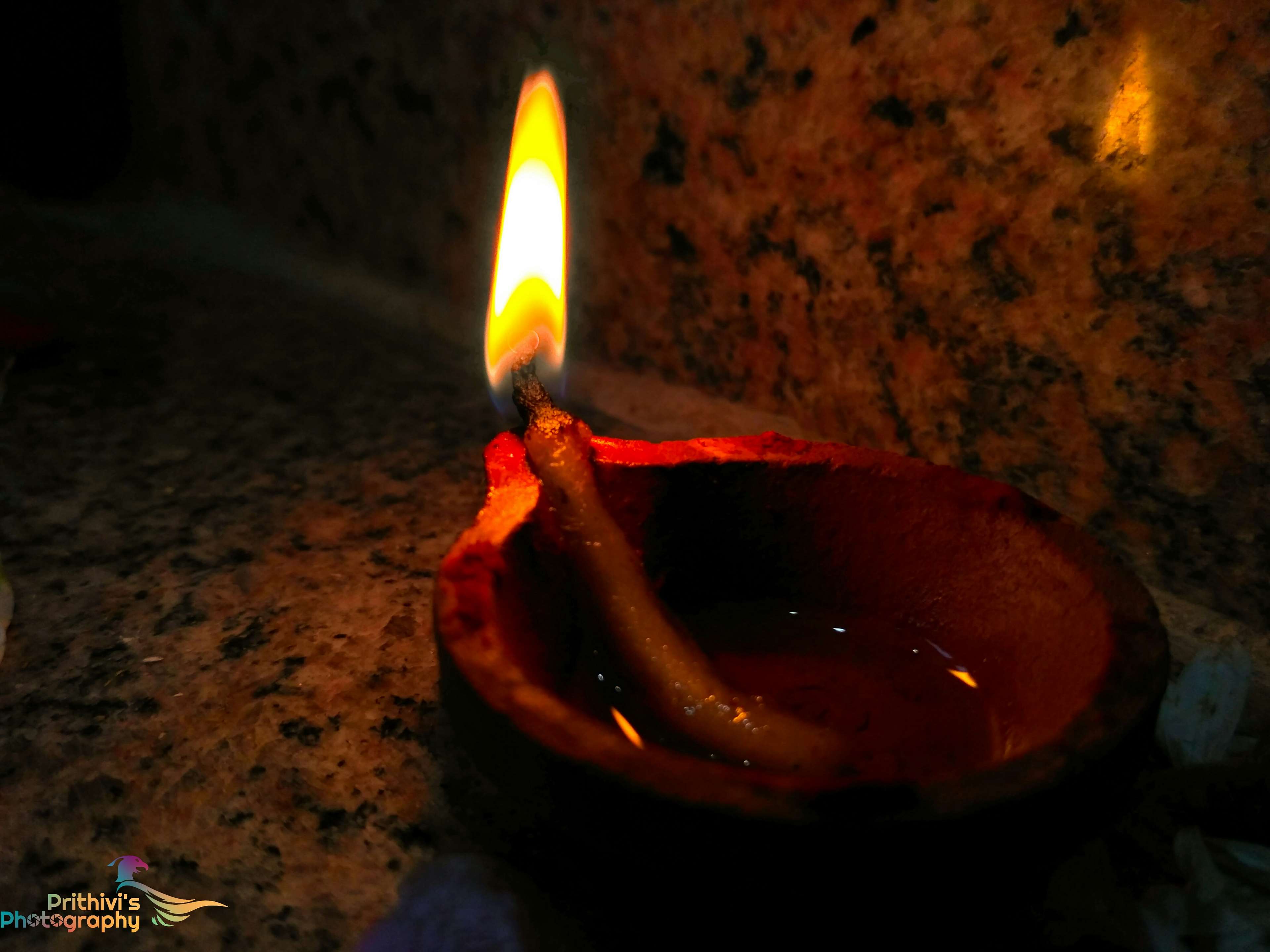 Diya lamp with flame in Tamil 4K HD Wallpaper