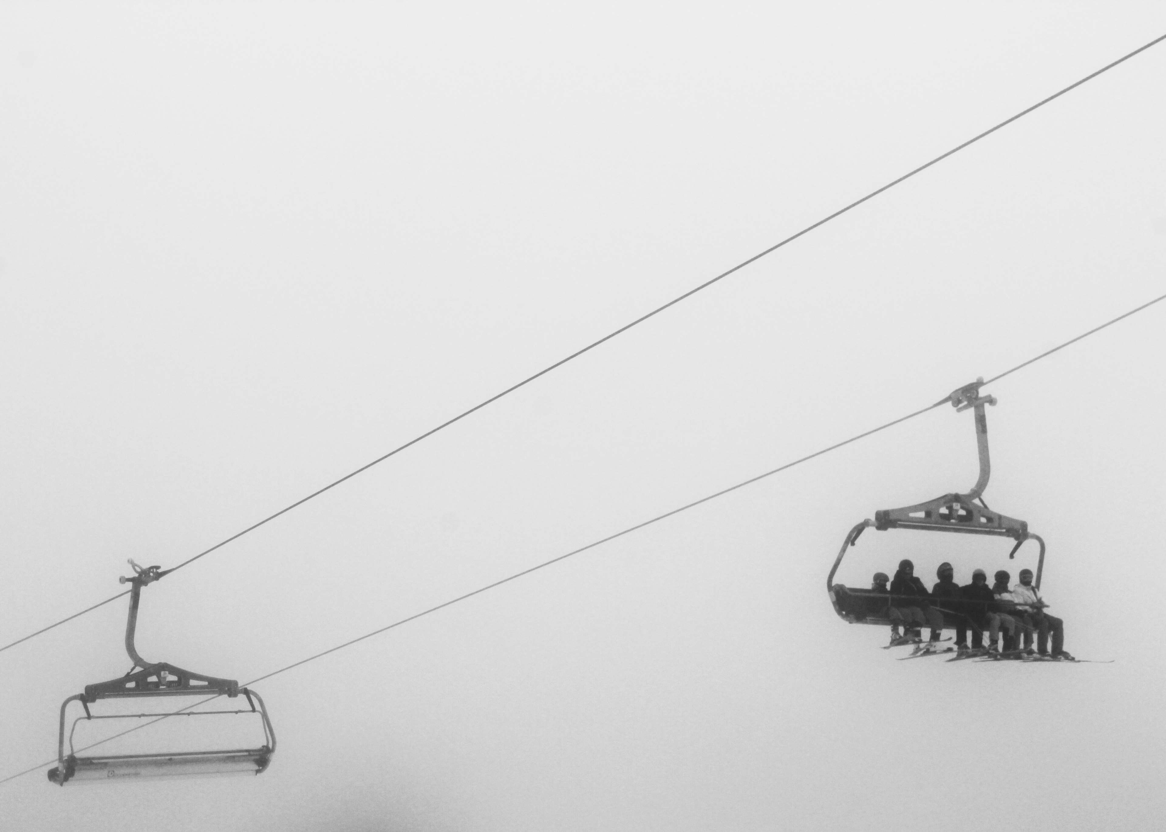 Ski lift with people in minimalist style HD Wallpaper
