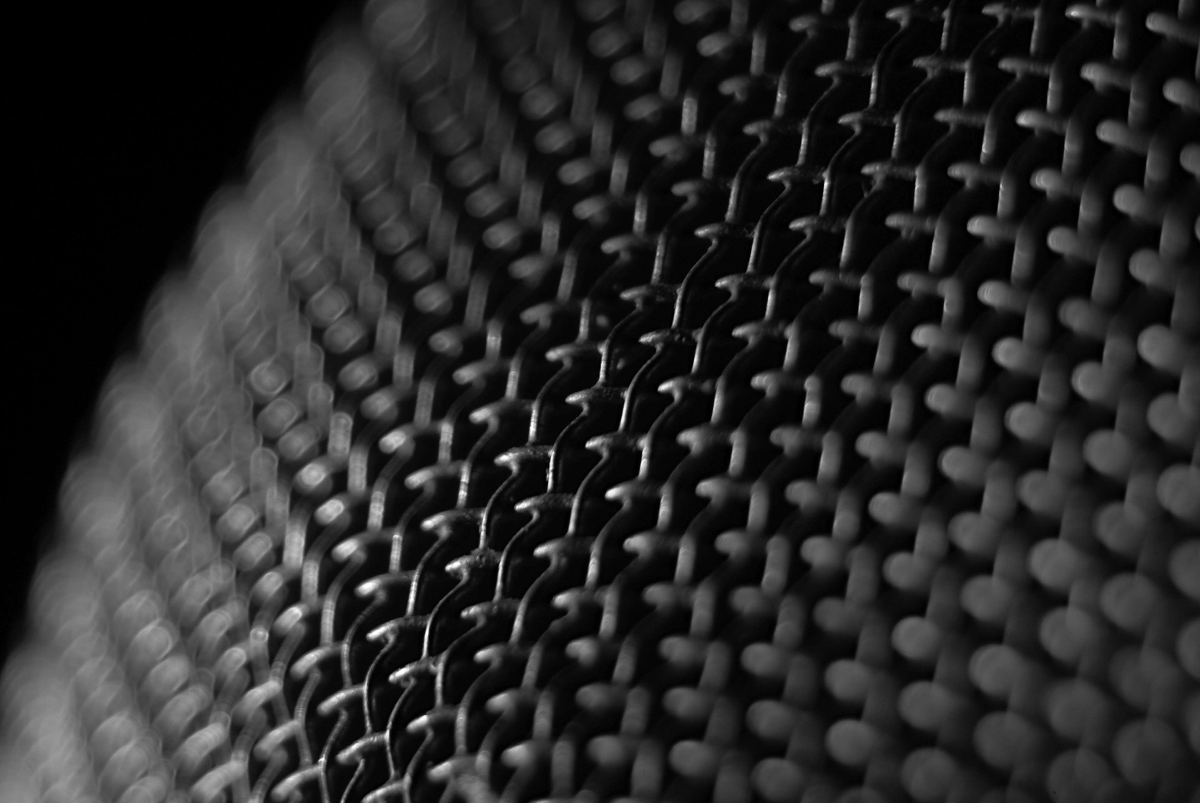 Close-up of a wire mesh texture HD Wallpaper