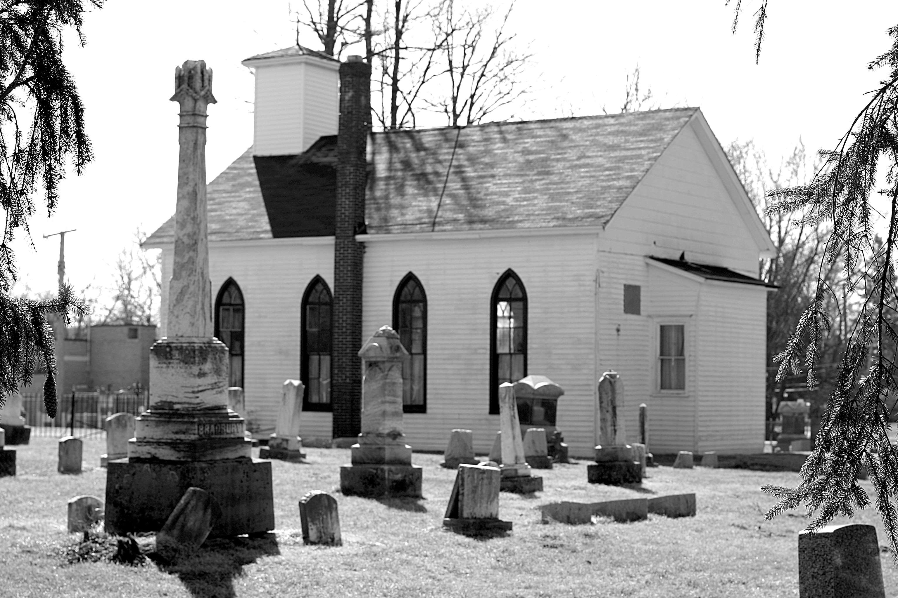 White church and graveyard with tombstones HD Wallpaper
