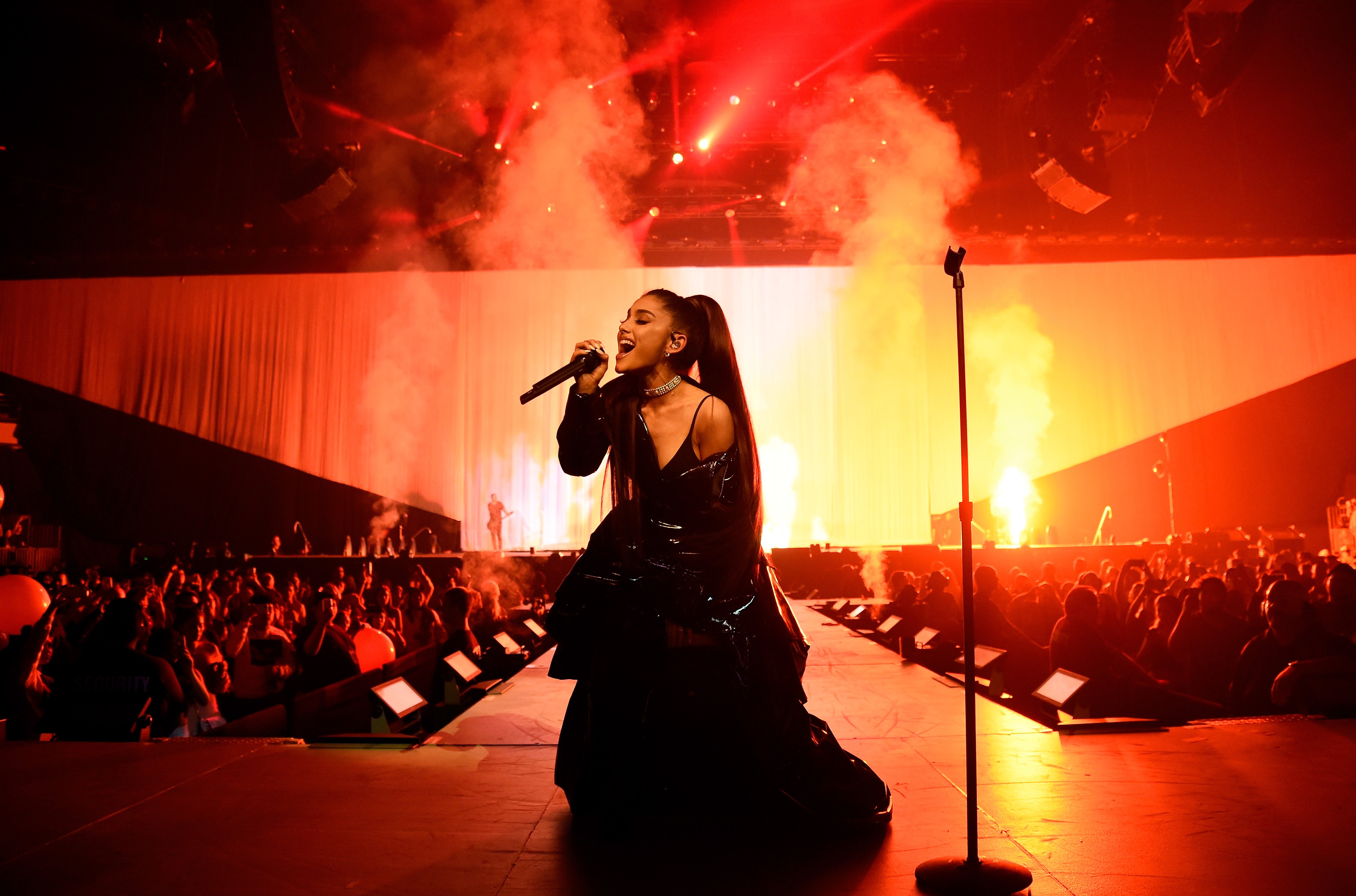 Ariana Grande performing on stage HD Wallpaper