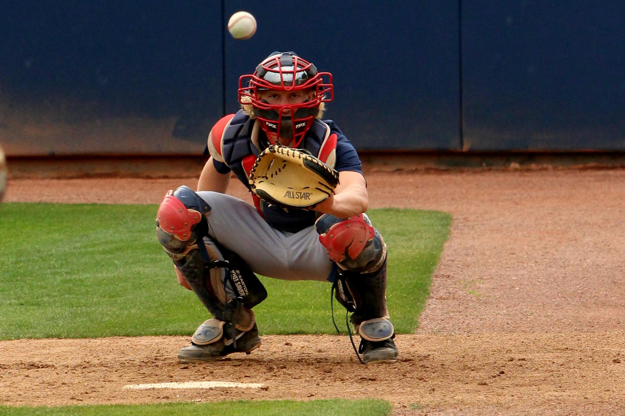 Baseball catcher in gear ready to catch ball HD Wallpaper