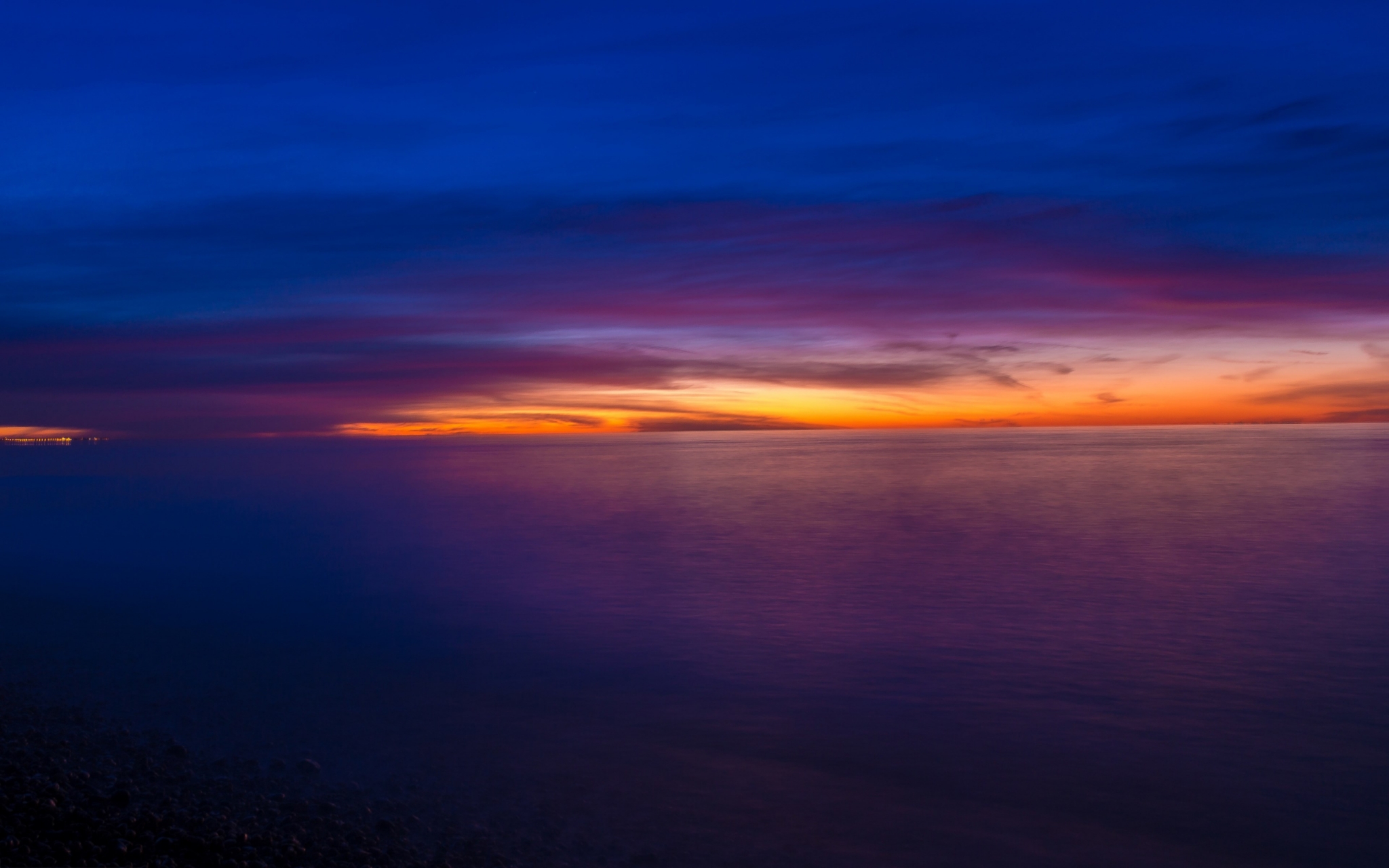 Sunset over the ocean with colorful clouds HD Wallpaper