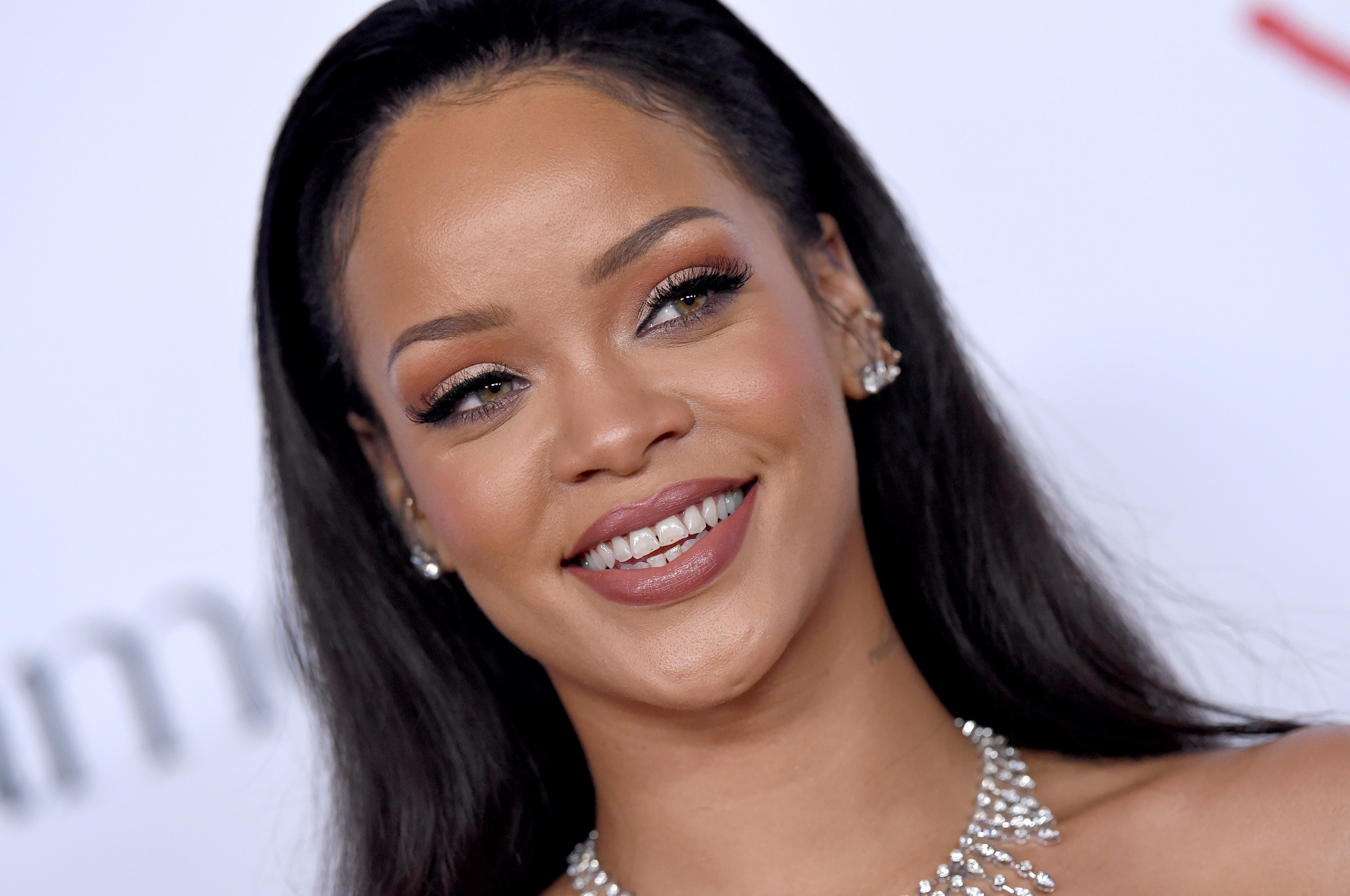 Rihanna Smiling with Elegant Jewelry HD Wallpaper